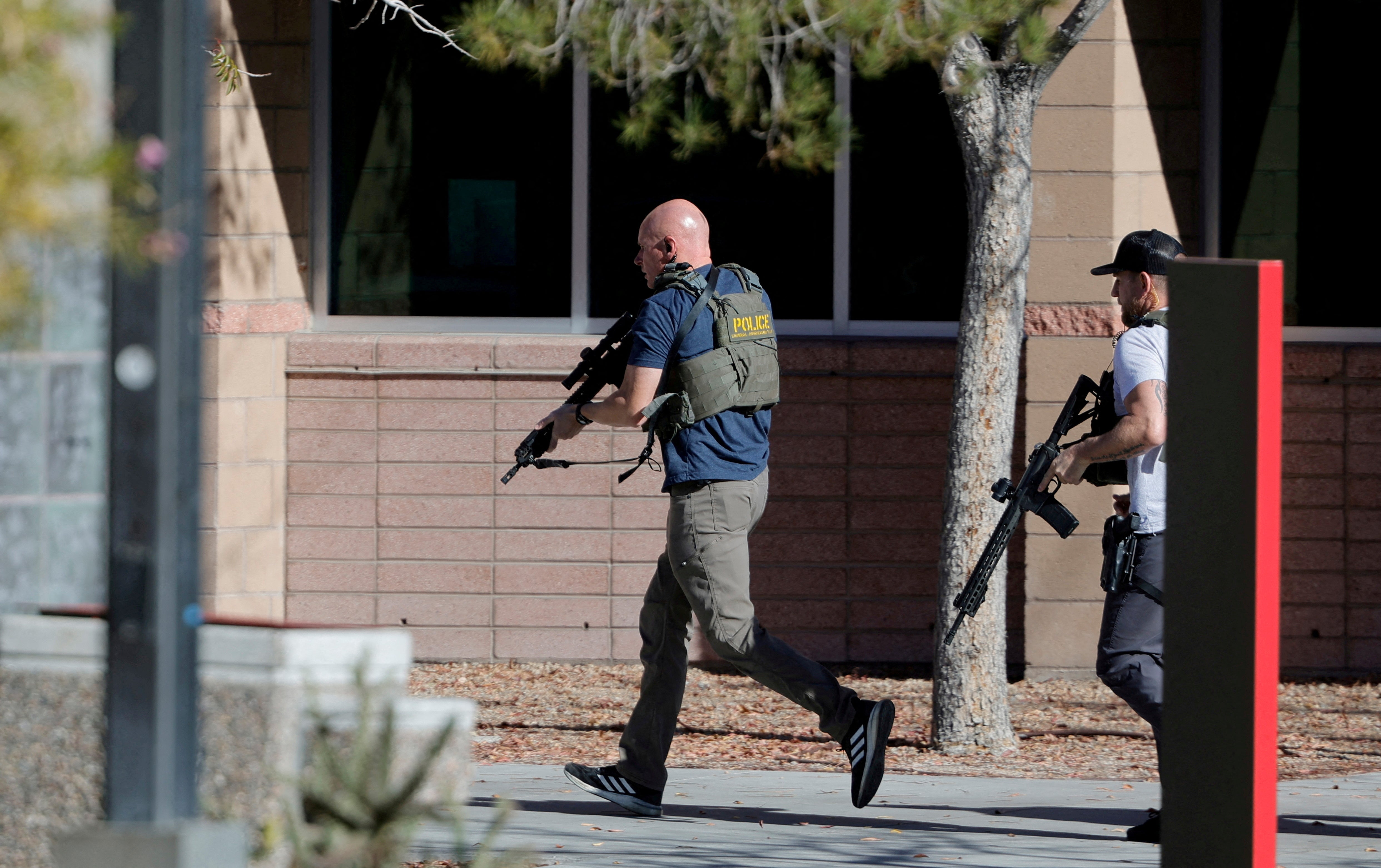 Law enforcement officers head into UNLV campus after reports of an active shooter in Las Vegas, Nevada, US 6 December 2023