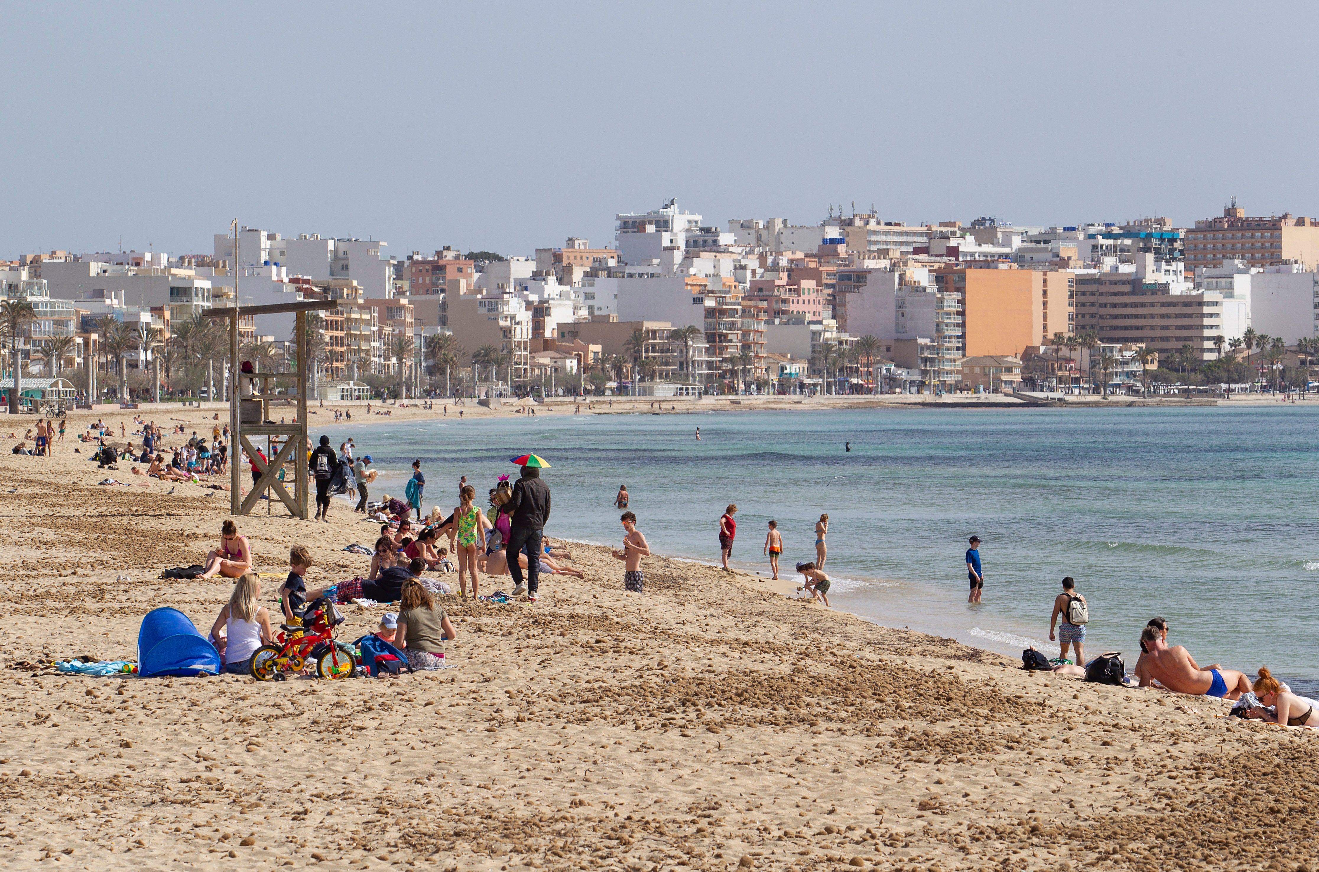 Tourists on Palma Beach in Palma de Mallorca