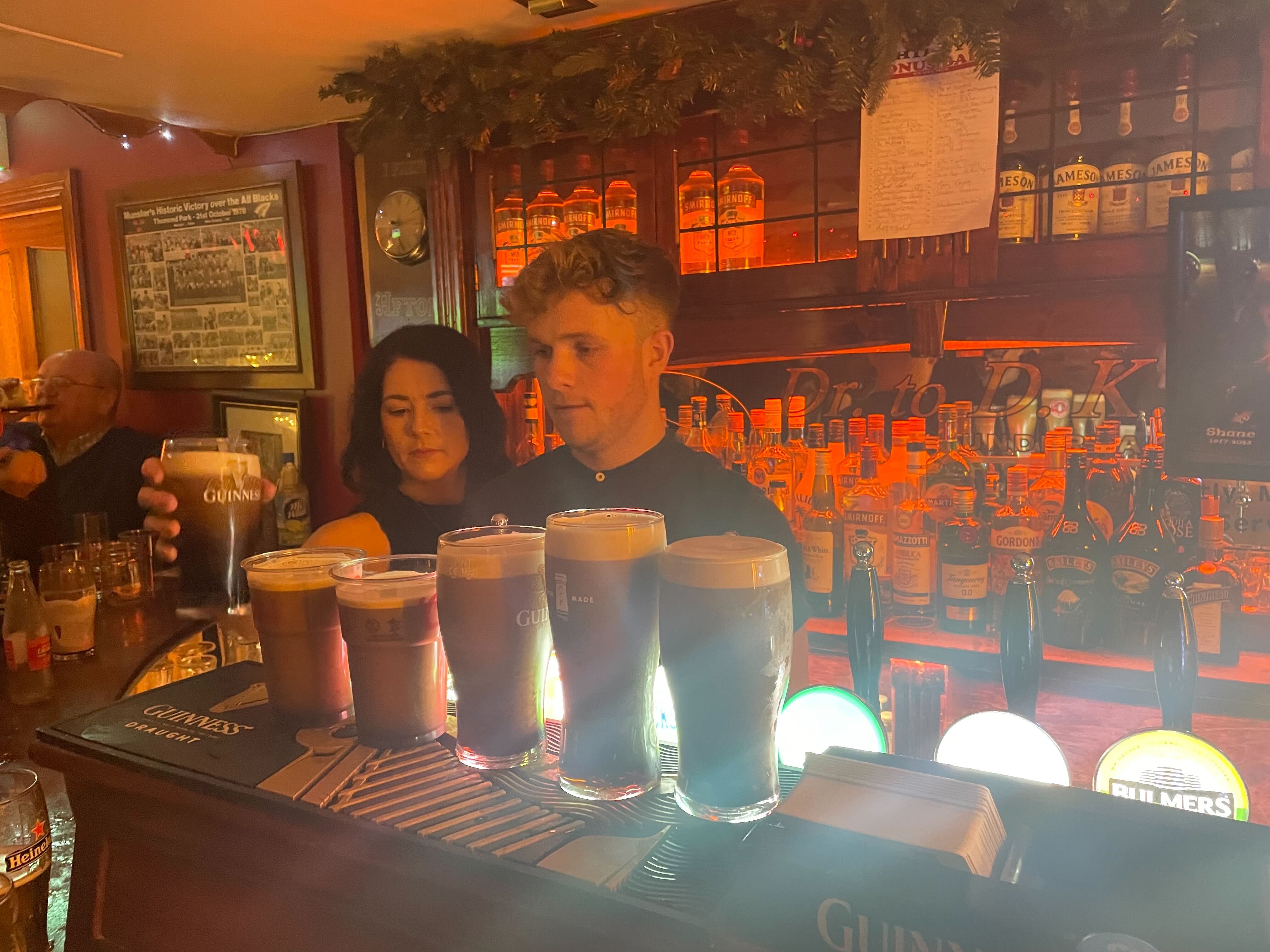 Lining up the pints at the unofficial wake at Philly’s bar