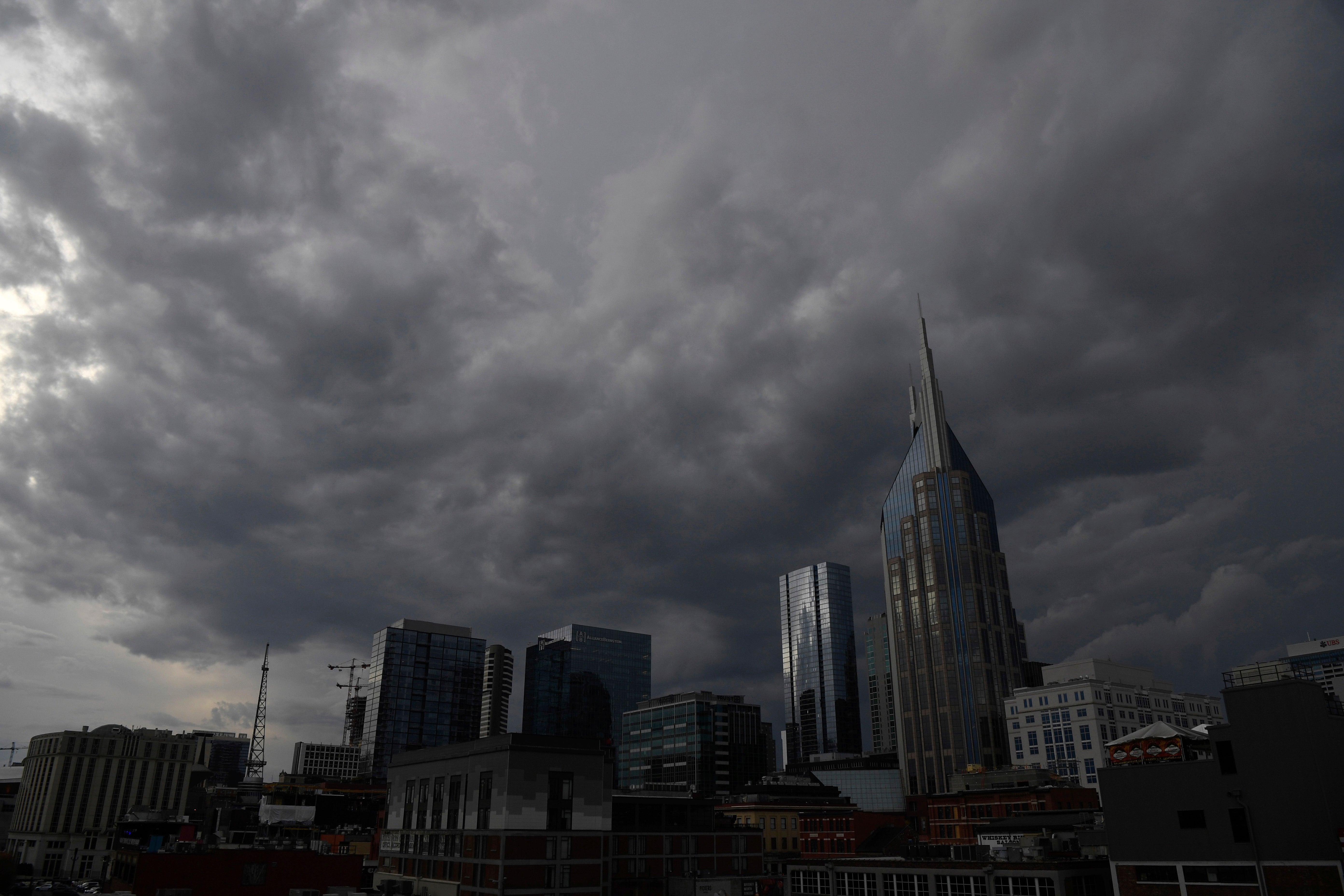 A storm front approaches downtown Nashville, Tenn., which spawned an apparent tornado north of the city, Saturday, 9 December2023