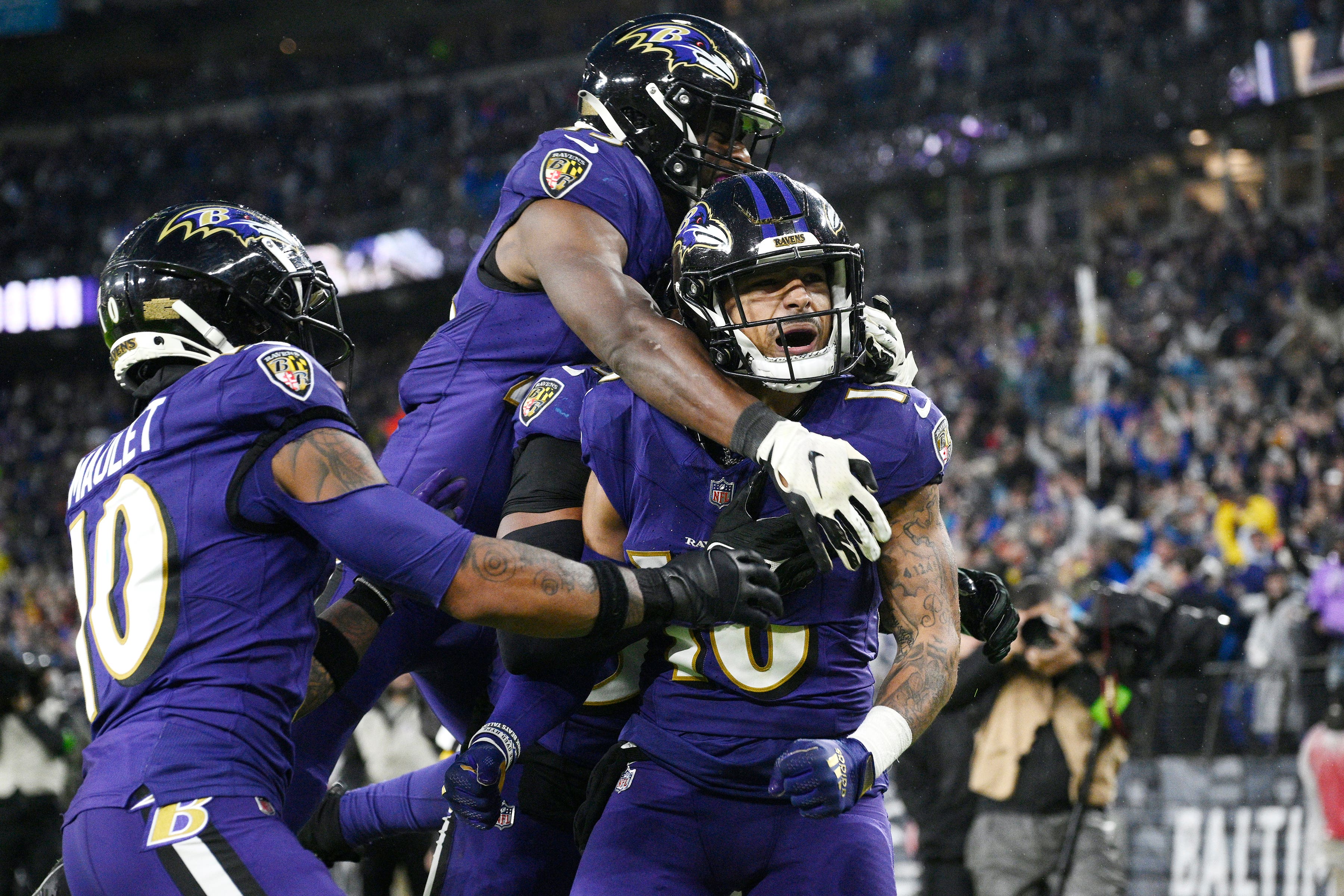 Tylan Wallace celebrates his game-winning touchdown (Nick Wass/AP)