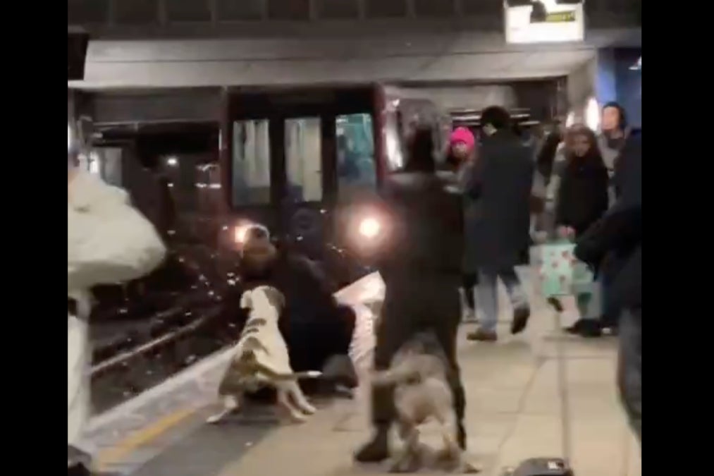 The man nearly falls in front of a train