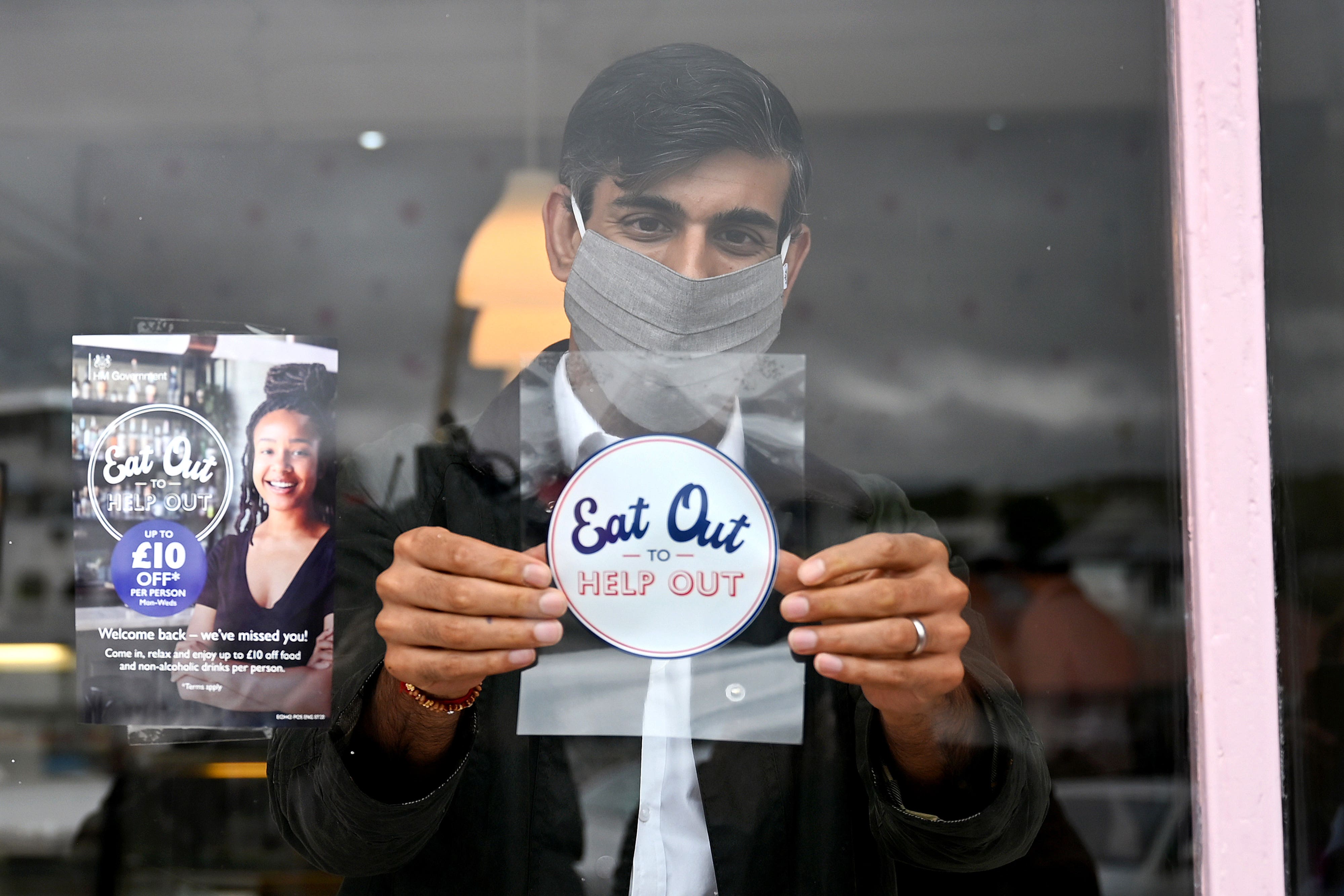 Rishi Sunak defended the Eat Out to Help Out scheme (Jeff J Mitchell/PA)