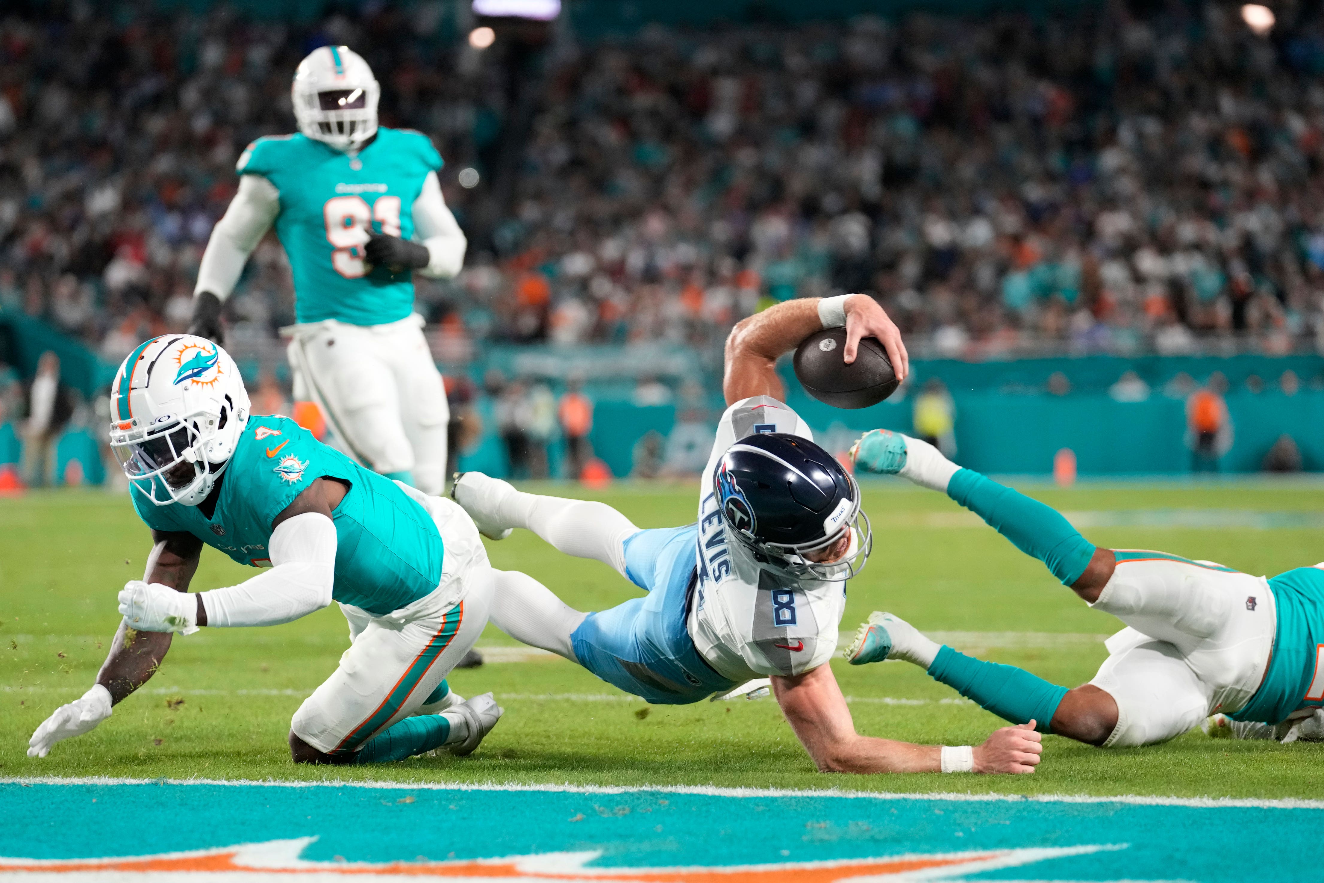 Tennessee Titans quarterback Will Levis falls with the ball near the end zone (Rebecca Blackwell/AP)