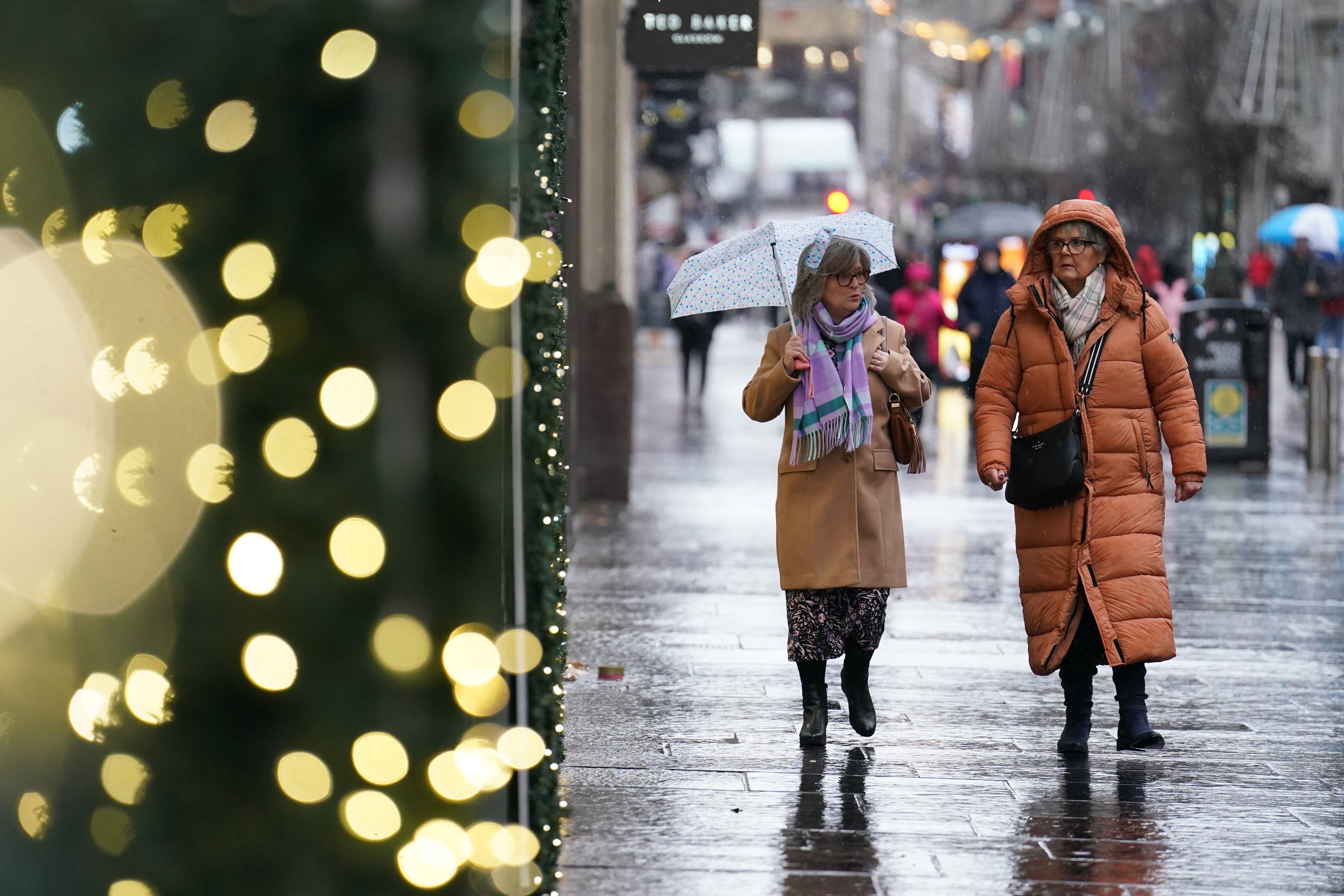 Parts of the UK may warm up after days of wet weather warnings, the Met Office said (Andrew Milligan/PA)