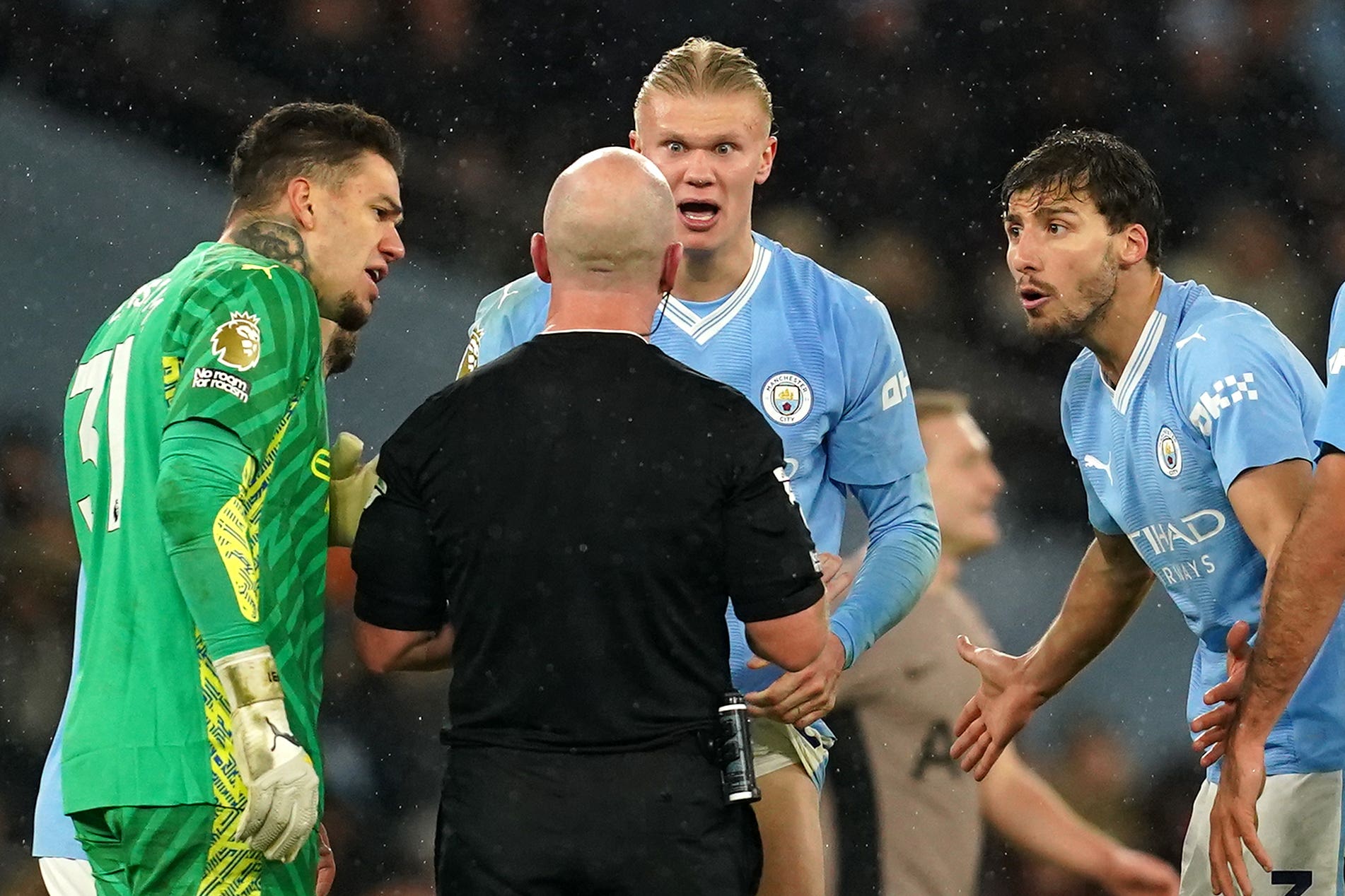 There have been fewer incidences of players surrounding referees this season (Martin Rickett/PA)