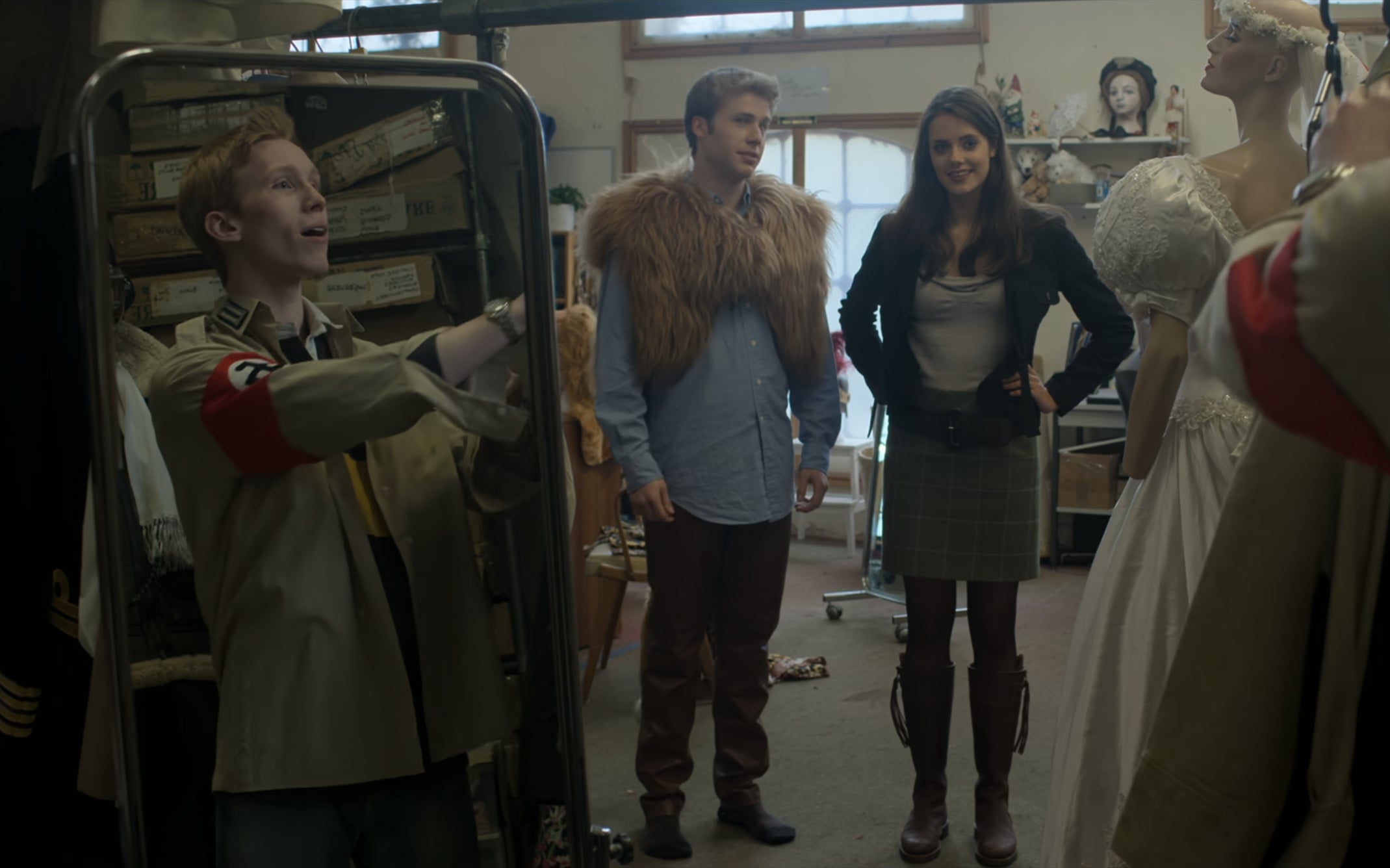 Harry (Luther Ford) tries on his costume in front of William (Ed McVey) and Kate (Meg Bellamy)