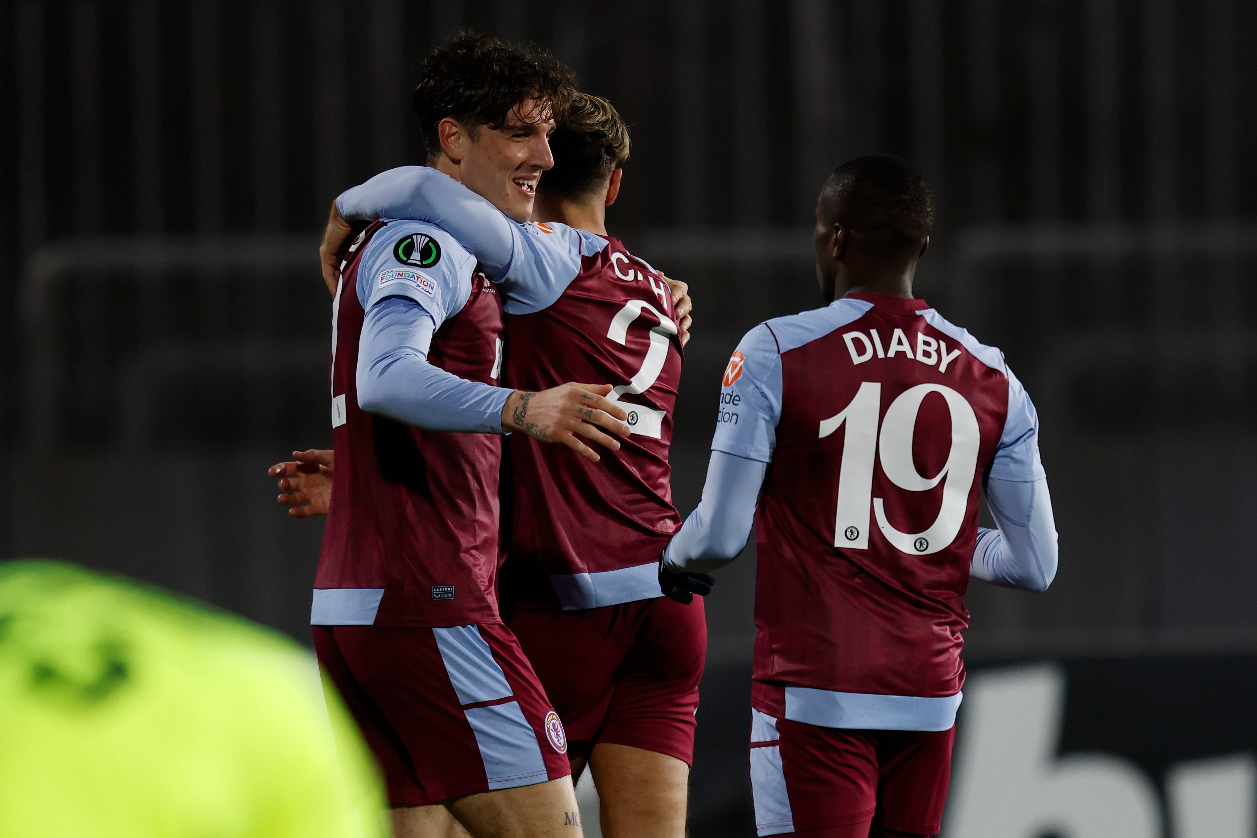 Aston Villa’s Nicolo Zaniolo, left, celebrates his first goal for the club in Mostar (Armin Durgut/AP)