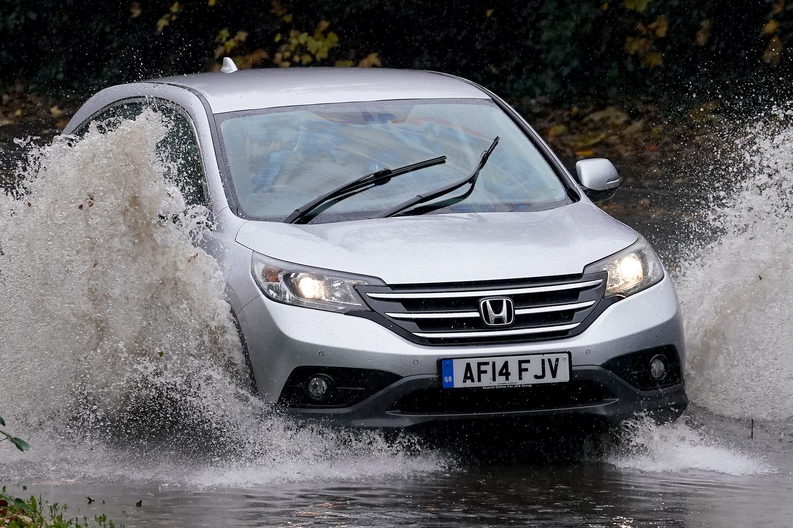 The amber warning for rain is in place for the entirety of Sunday (Gareth Fuller/PA)