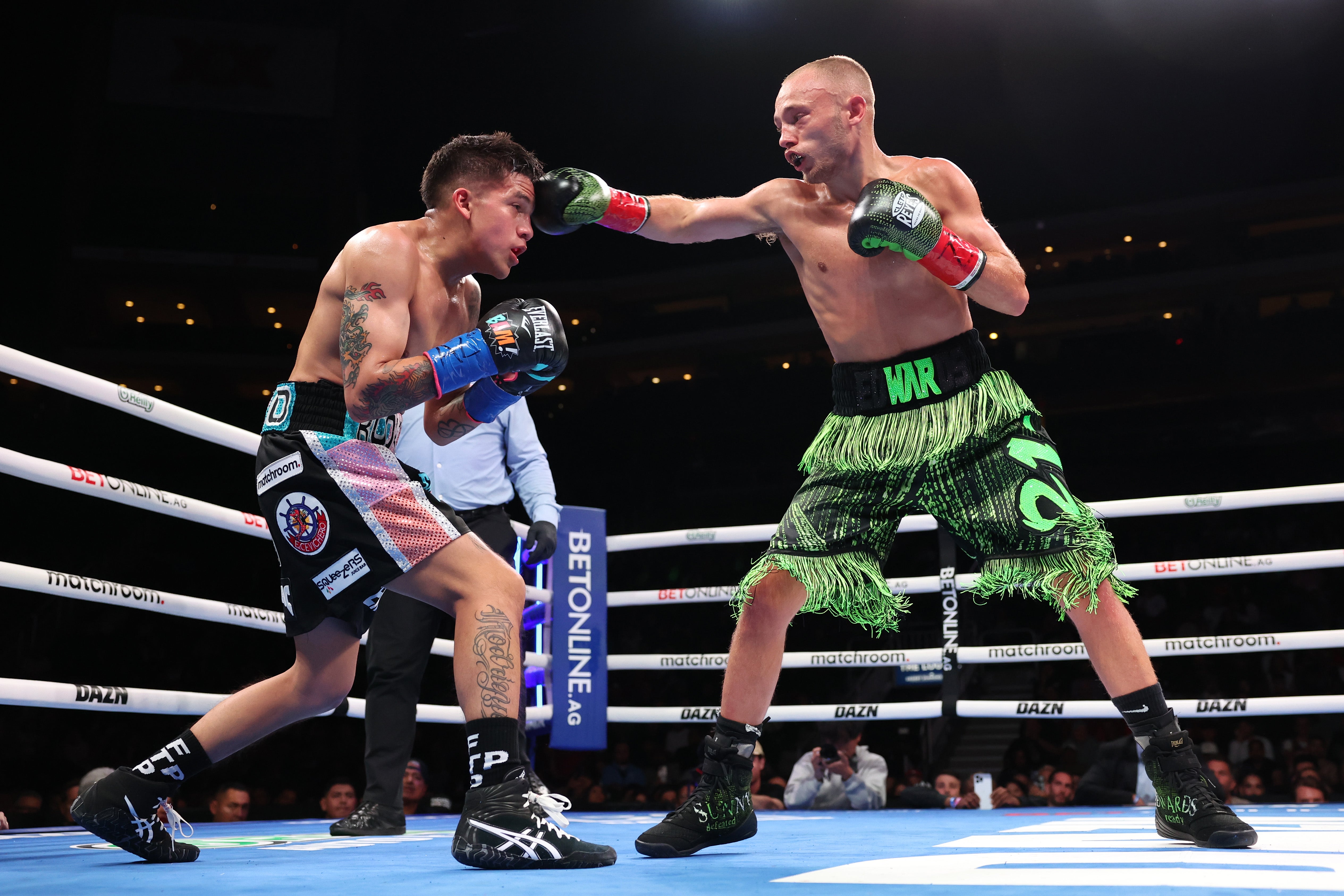 The first six rounds between Rodriguez (left) and Edwards were competitive