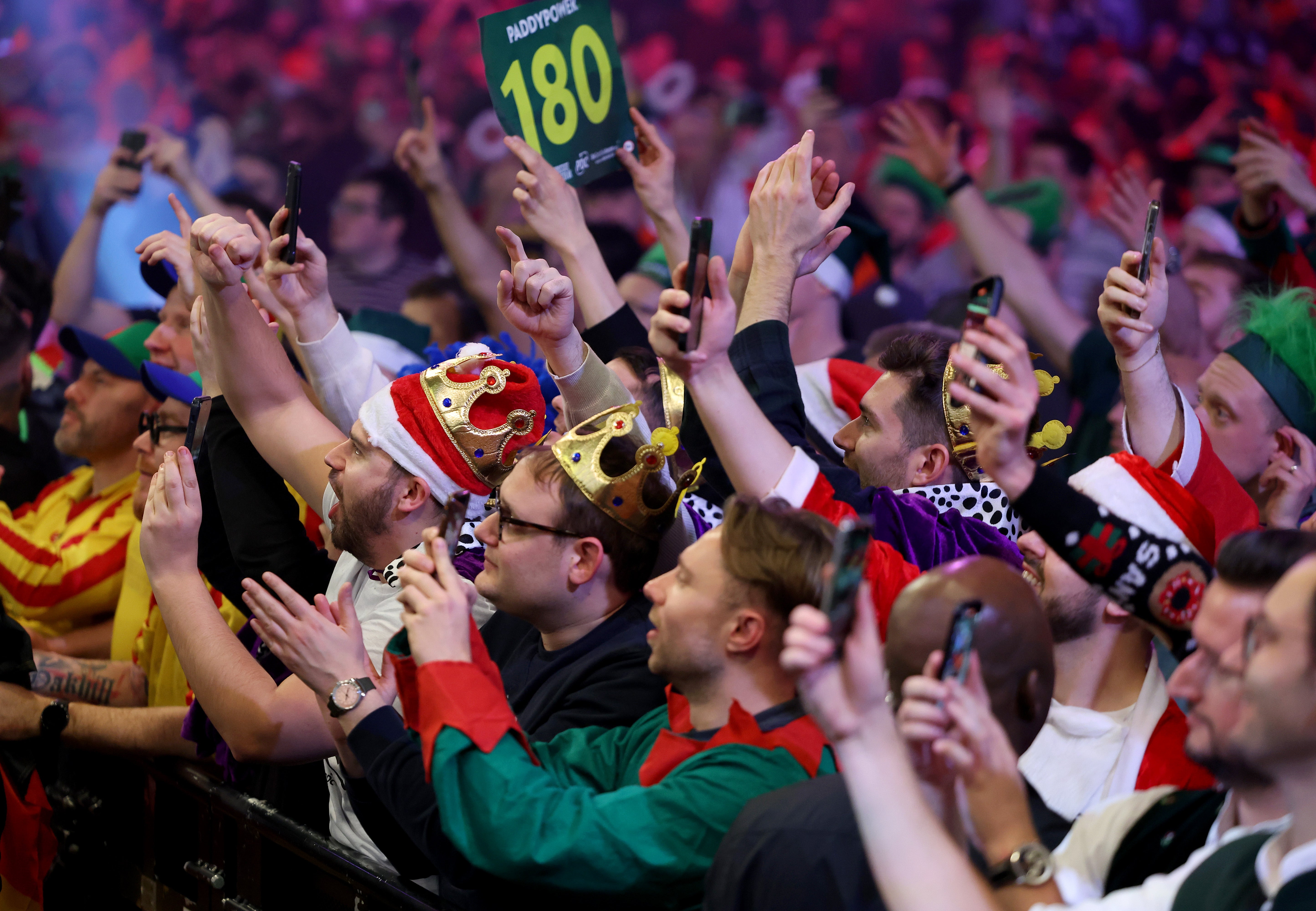 Kings among men: crowned audience members look on in excitement