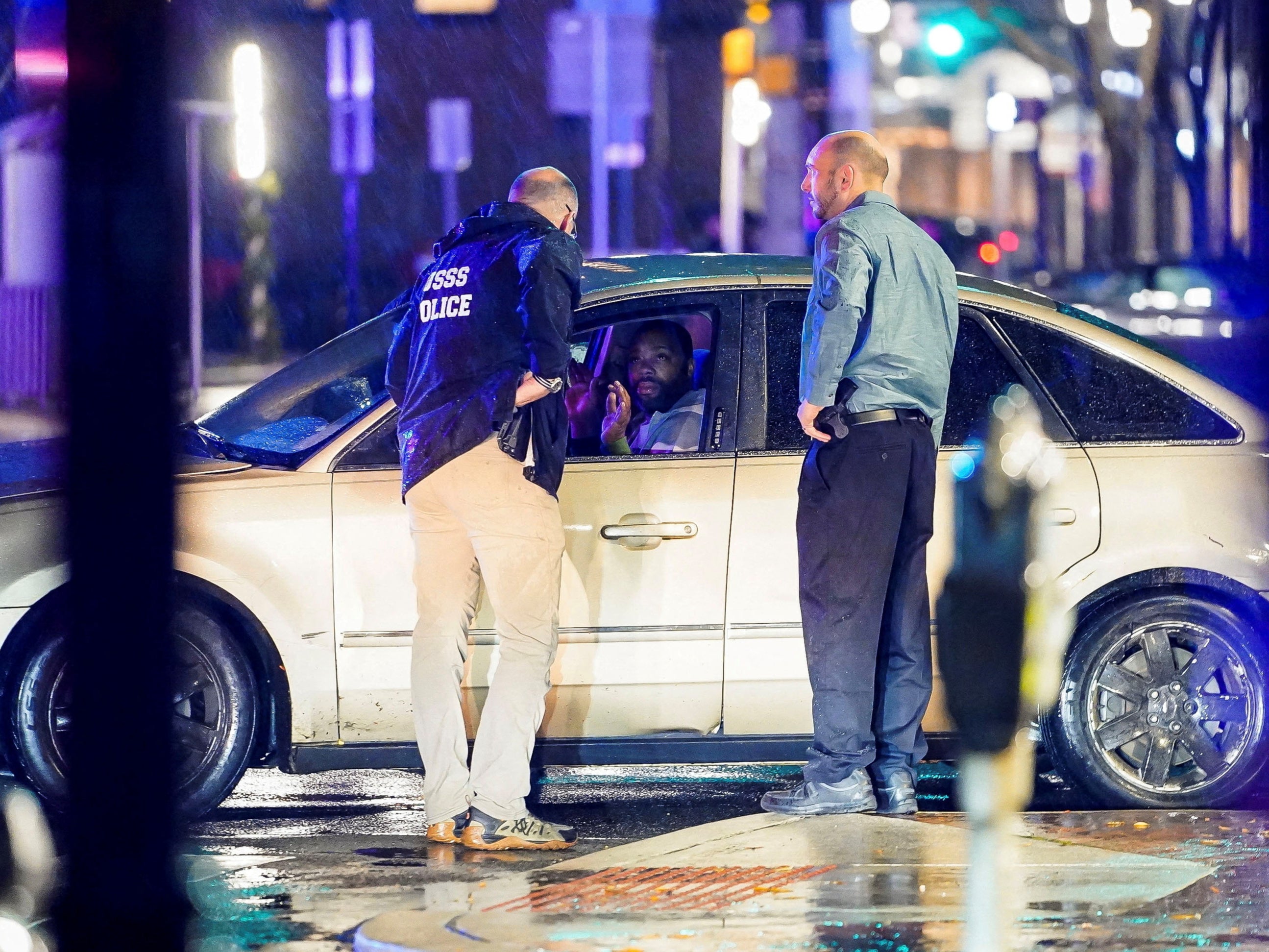 Secret Service agents speak to the driver that caused the crash