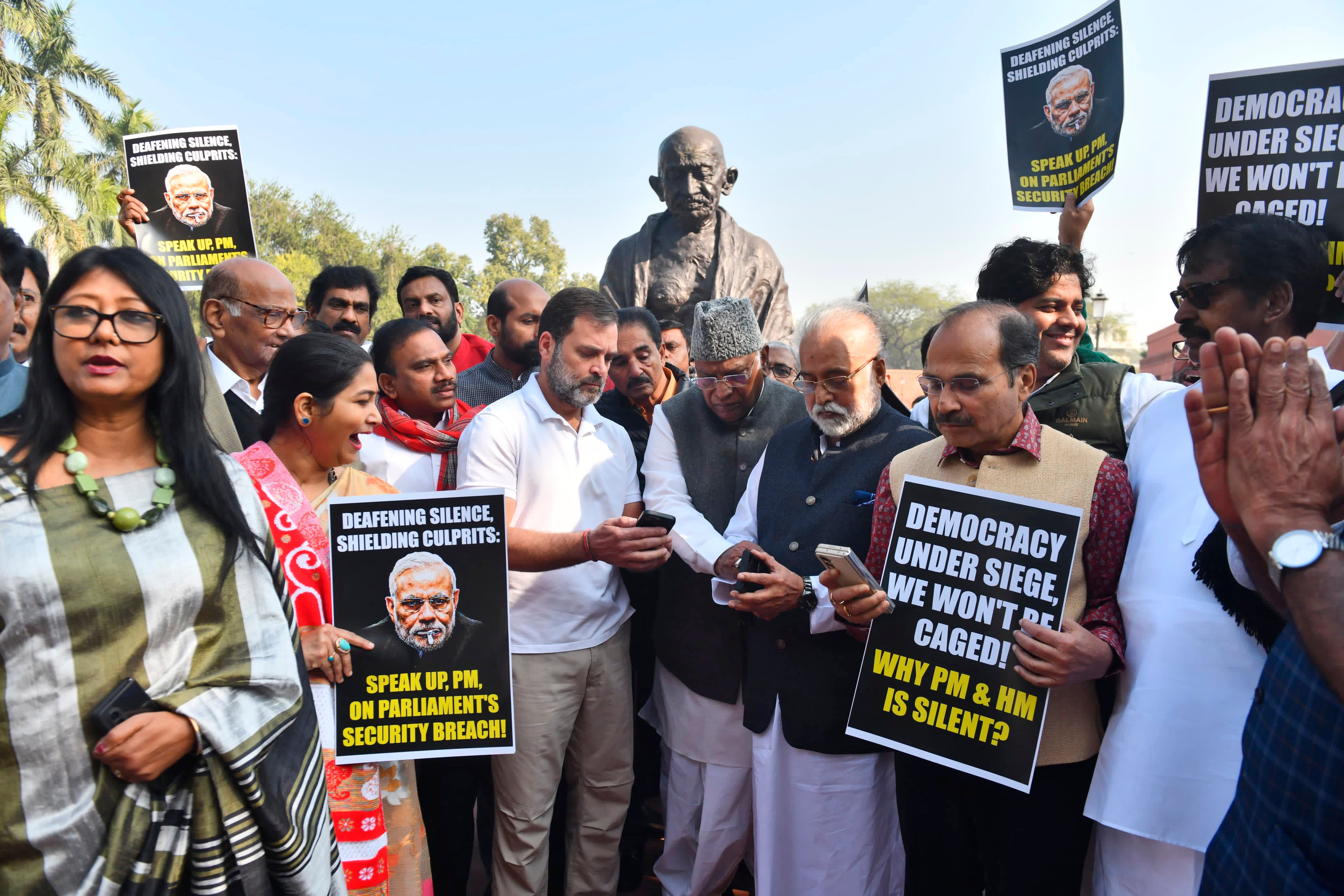 Congress party leader Rahul Gandhi, center, join other lawmakers in a protest against the suspension of lawmakers, in New Delhi, India, Tuesday, 19 December 2023