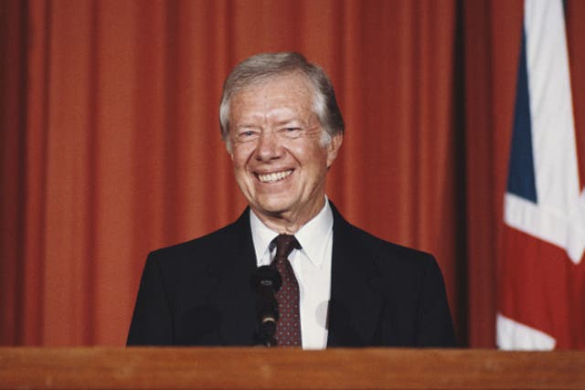 <p>Former president Jimmy Carter holds a press conference at the American Embassy in London, UK, on 27 January 1986</p>