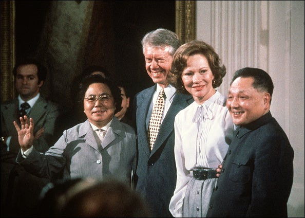 Chinese modernizer Deng Xiaoping, US First Lady Rosalynn Carter, US President Jimmy Carter and Deng's wife Cho Lin smile for the media at the White House in Washington DC, during the Chinese leader's visit to the US