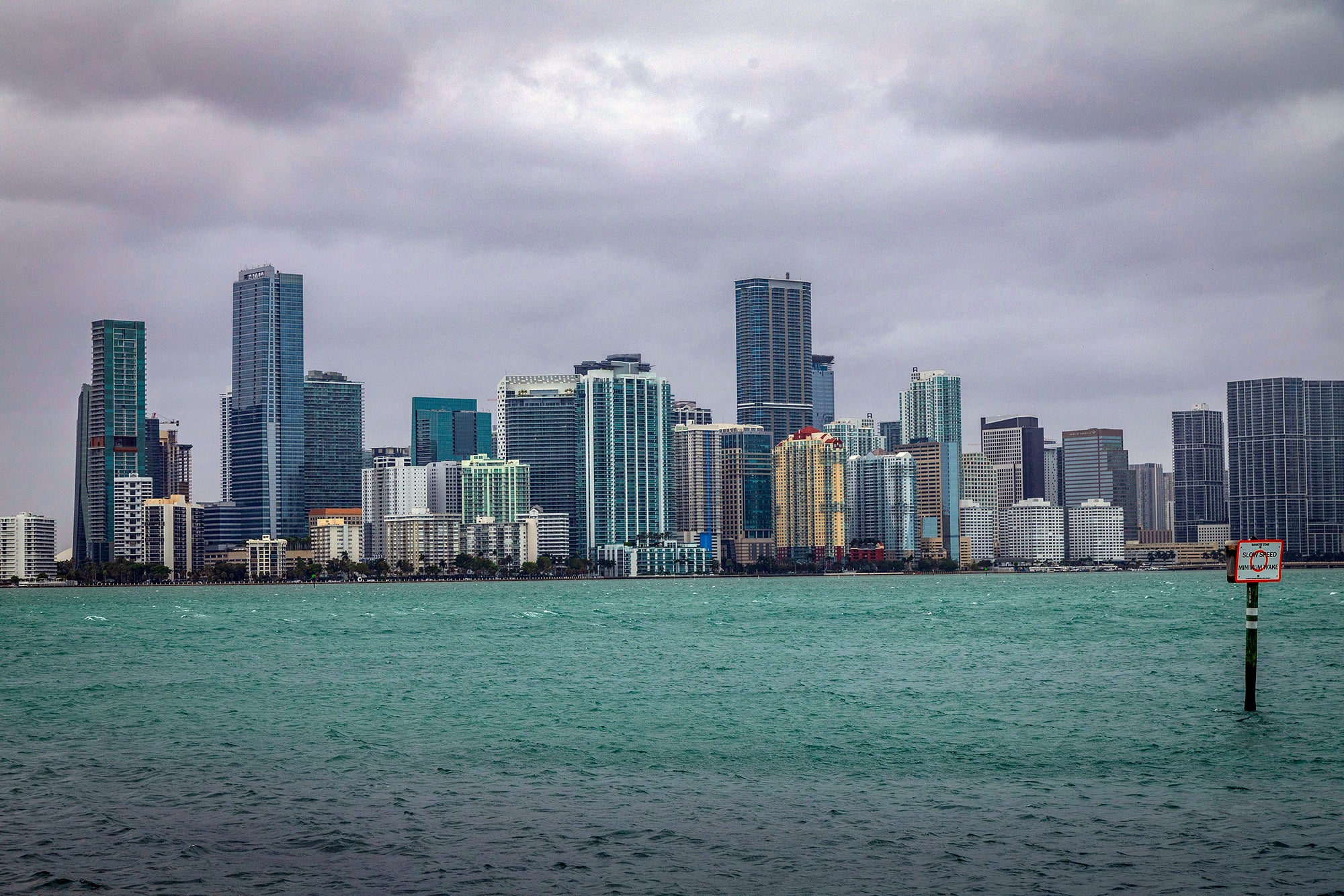 The Miami skyline is viewed from the Rickenbacker Causeway in South Florida, Dec. 15, 2023