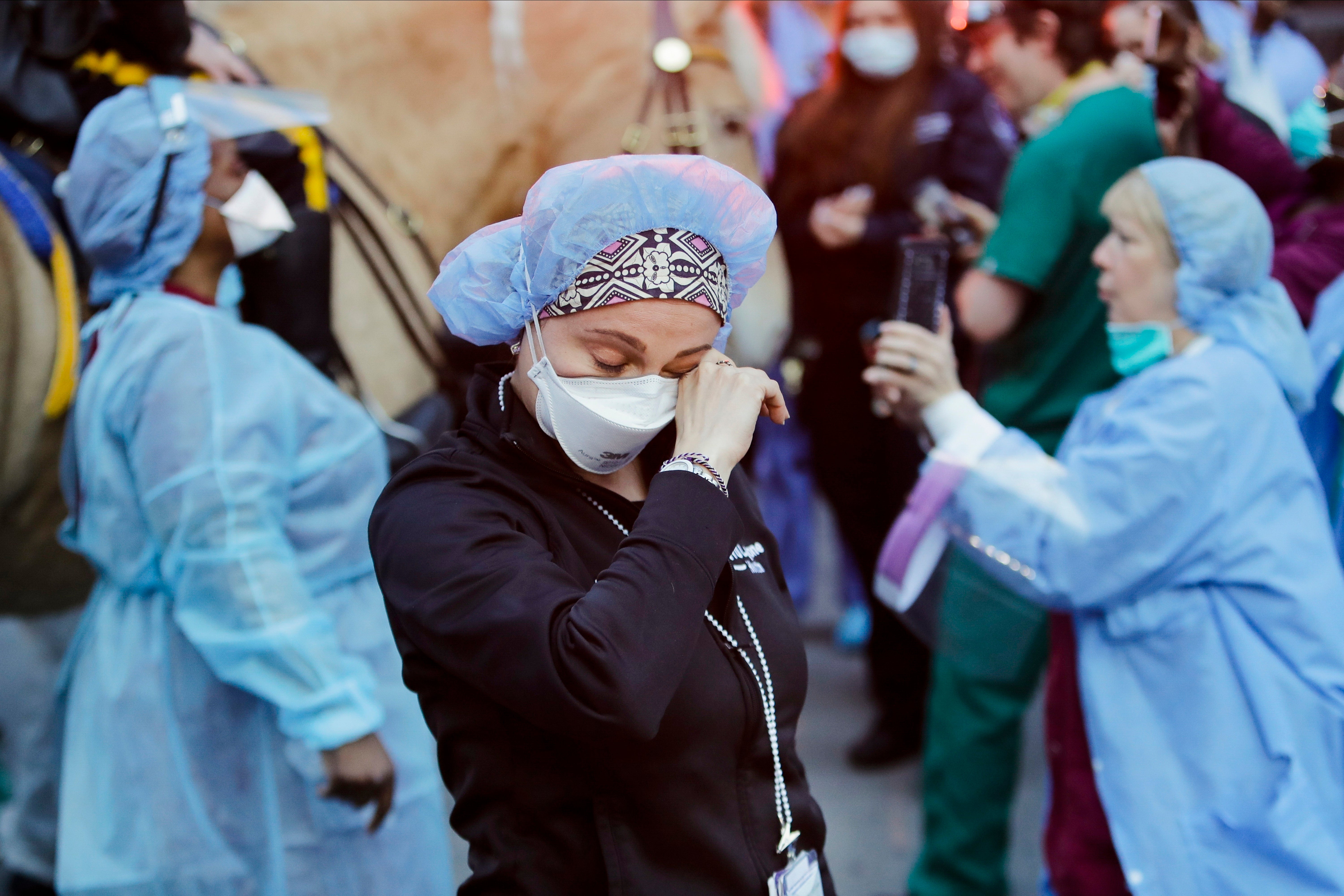 <p>A medical worker reacts as police officers and pedestrians cheer them outside NYU Medical Center in New York, April 16, 2020. Scientists now say that anxiety levels among U.S. adults appear to have stayed steady during that period, with new <a href="https://journals.sagepub.com/doi/10.1177/21677026251359621">research</a> challenging the belief that there was a widespread spike in psychological distress. </p>