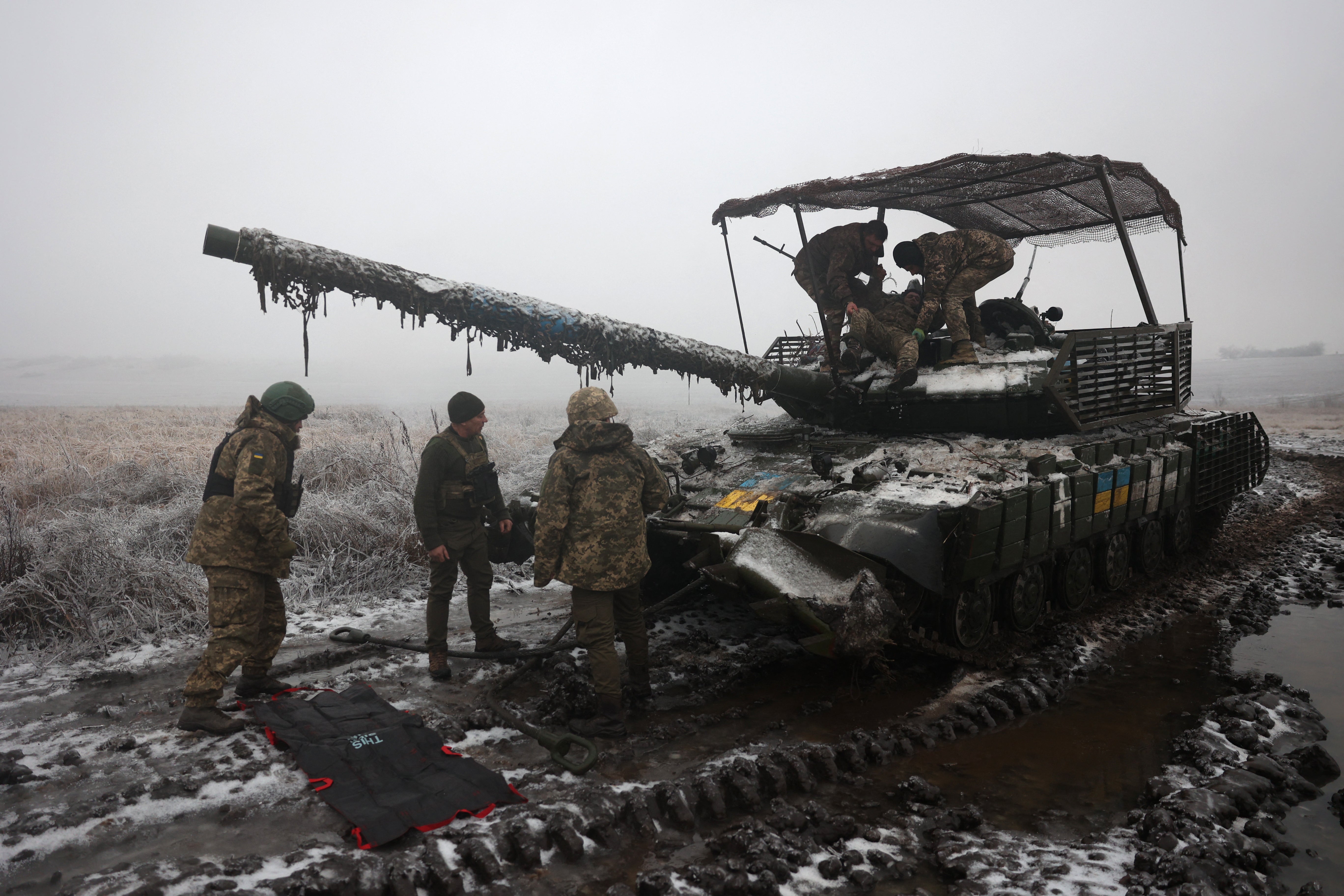 Ukrainian tank crews take part in a drill not far from the front line in the Bakhmut direction