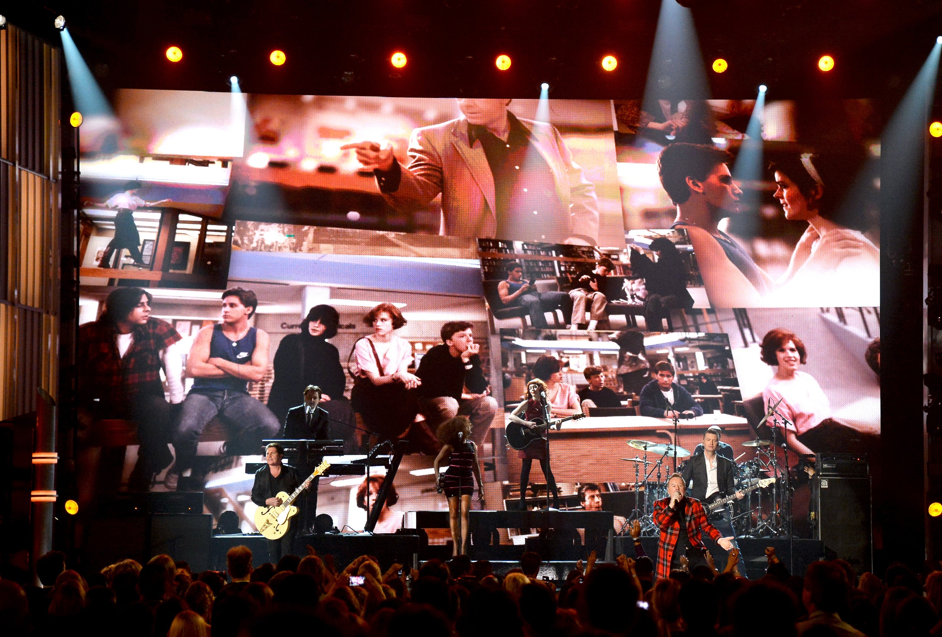 Guitarist Charlie Burchill, singer Jim Kerr and bassist Ged Grimes of Simple Minds perform onstage during the 2015 Billboard Music Awards in Las Vegas, Nevada