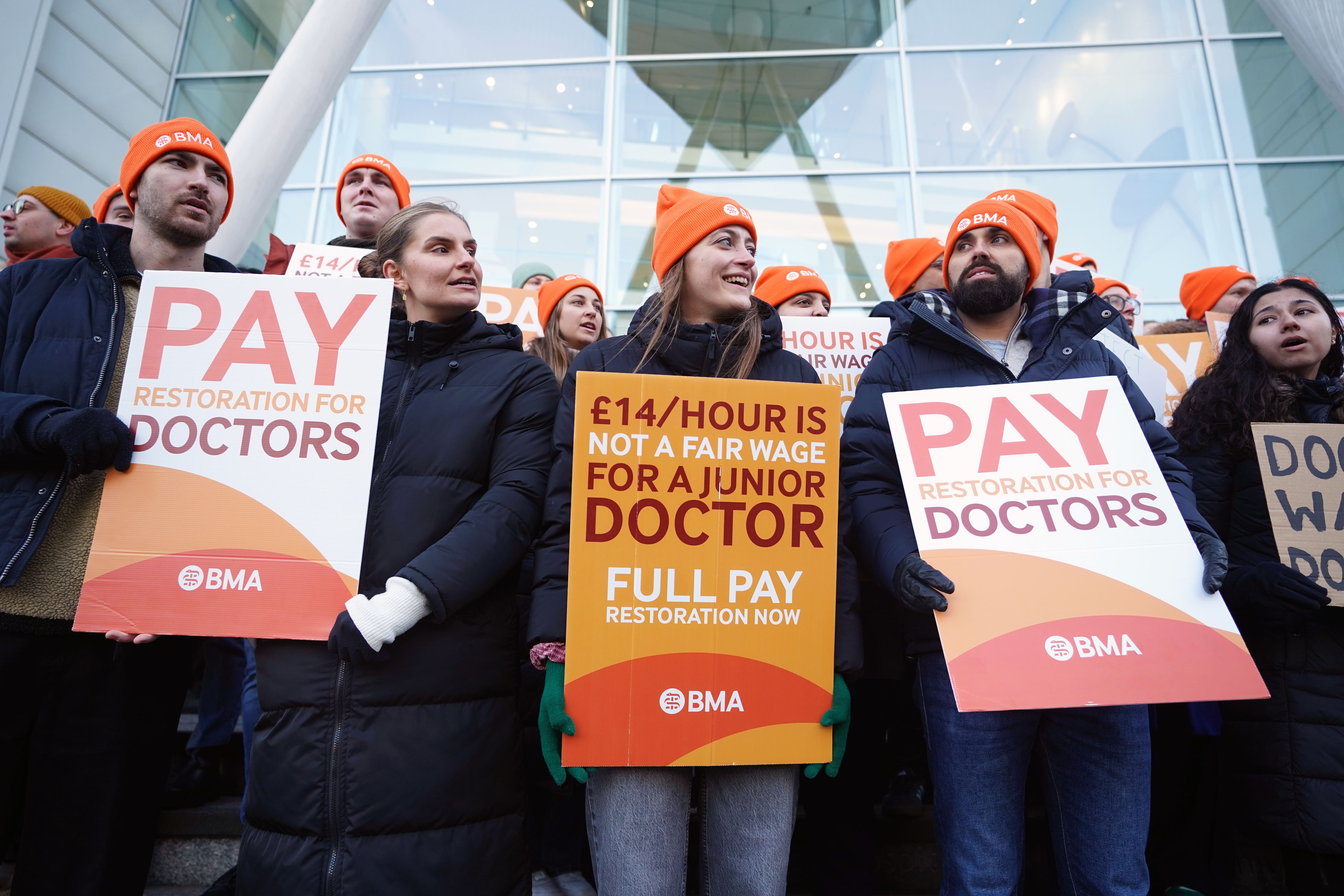 Junior doctors who are members of the British Medical Association on the picket line in London