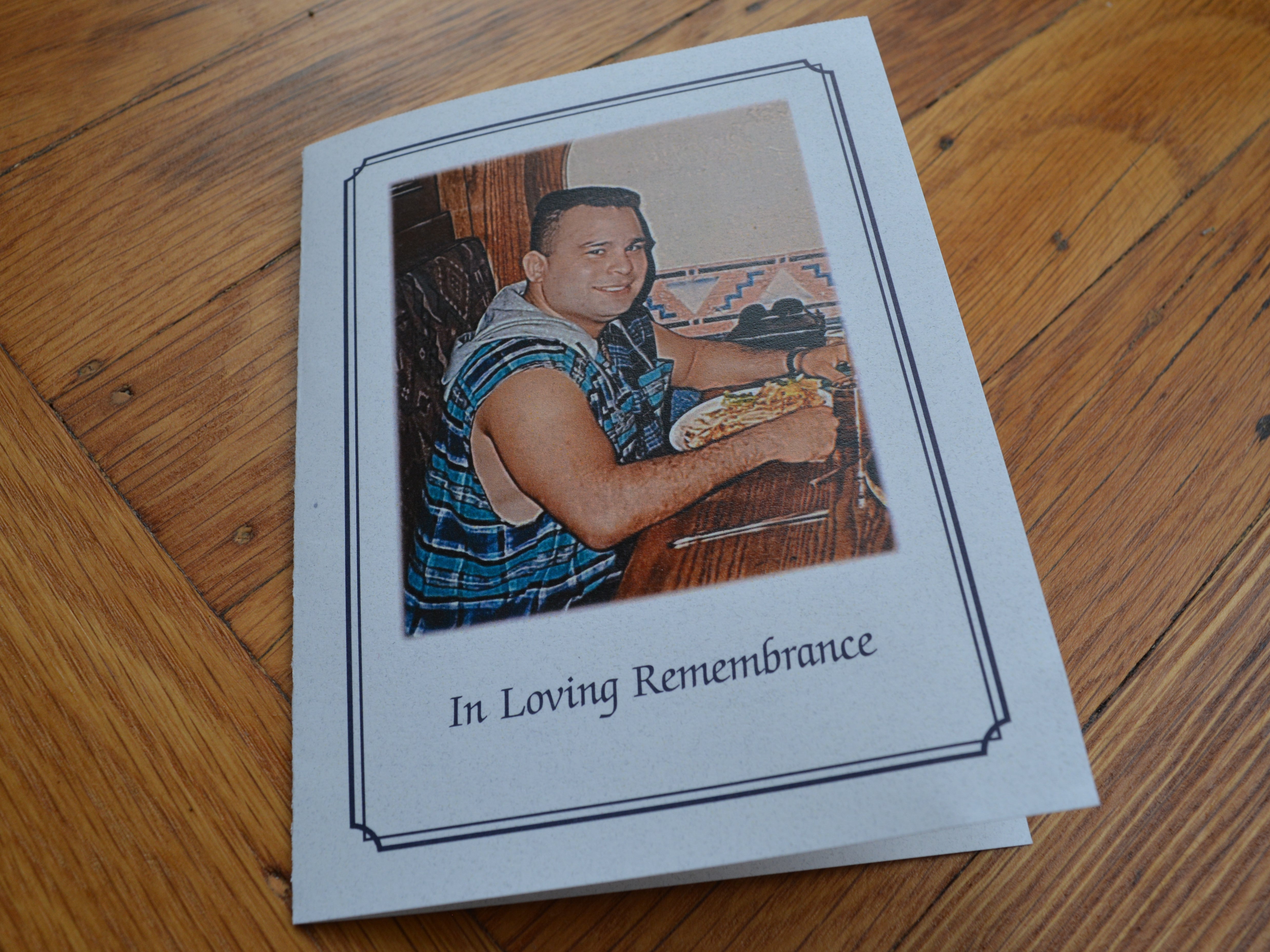 A memorial program for Michael Flores, who died in November after entering Inside Safe