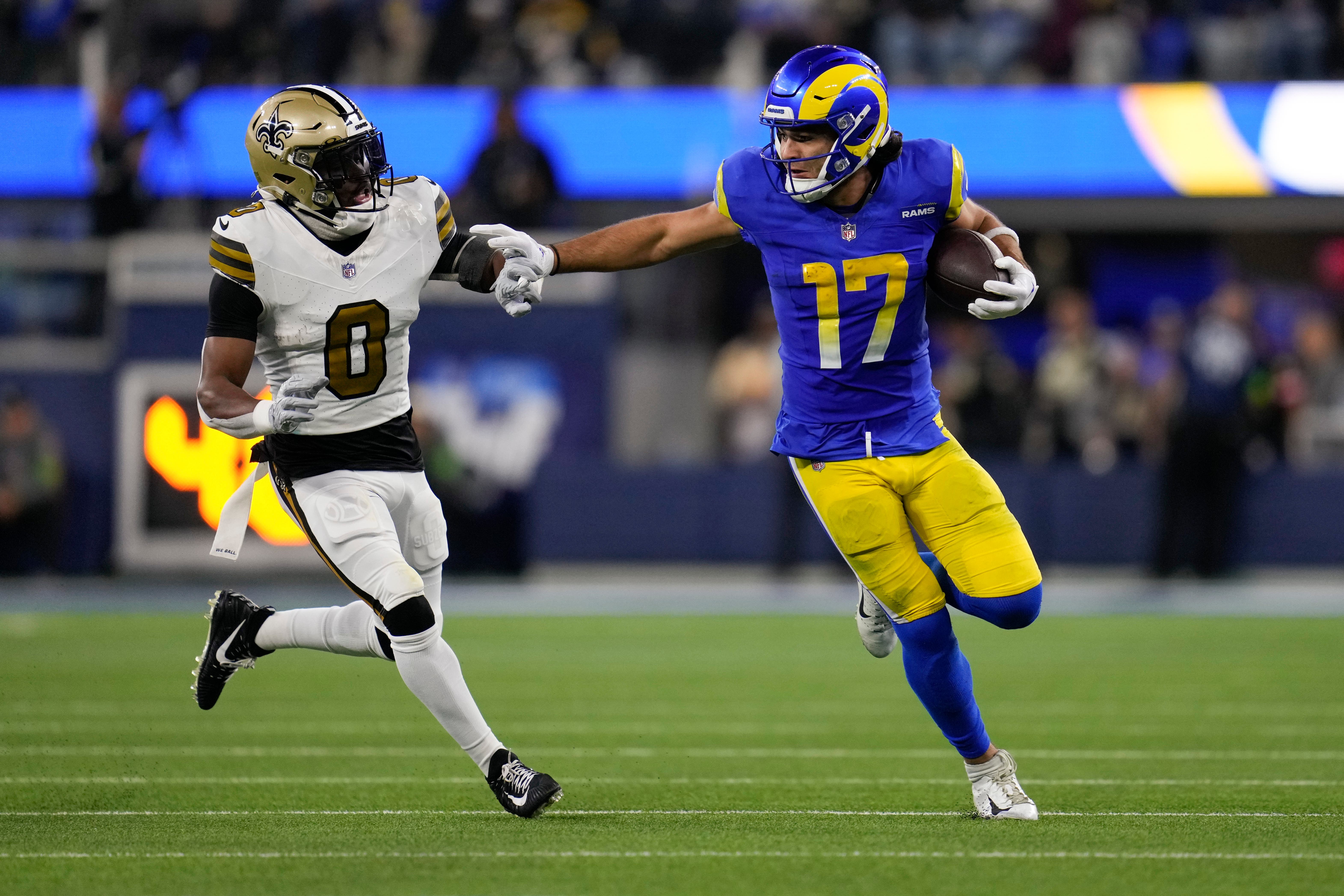 Los Angeles Rams wide receiver Puka Nacua (17) runs past New Orleans Saints safety Ugo Amadi (0) (Ashley Landis/AP)