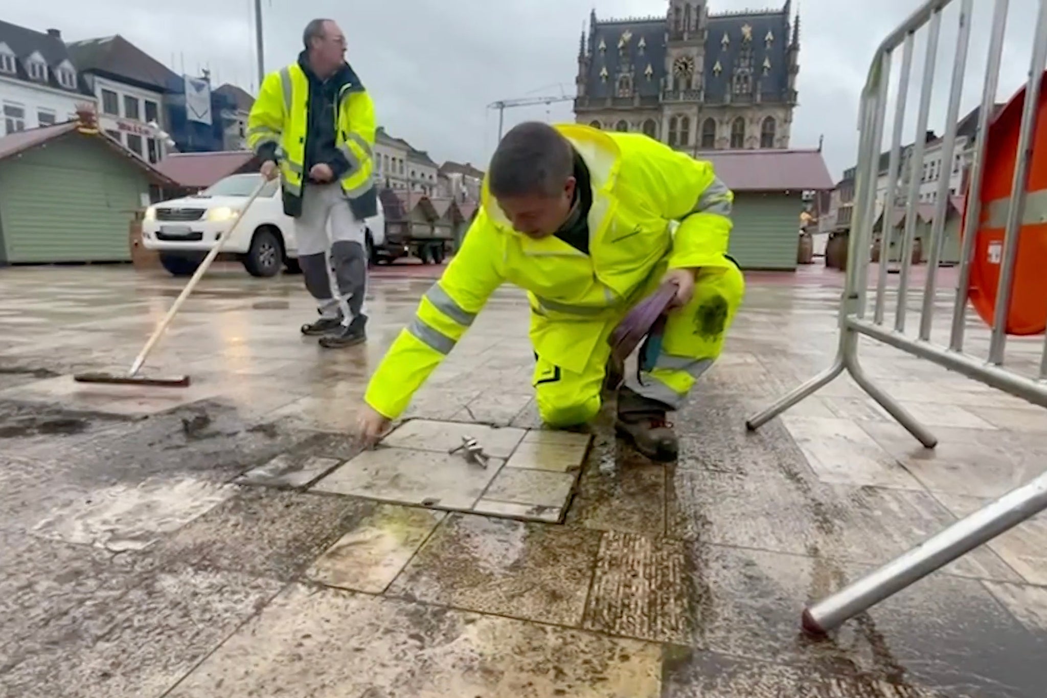 Authorities clean up the site of the incident