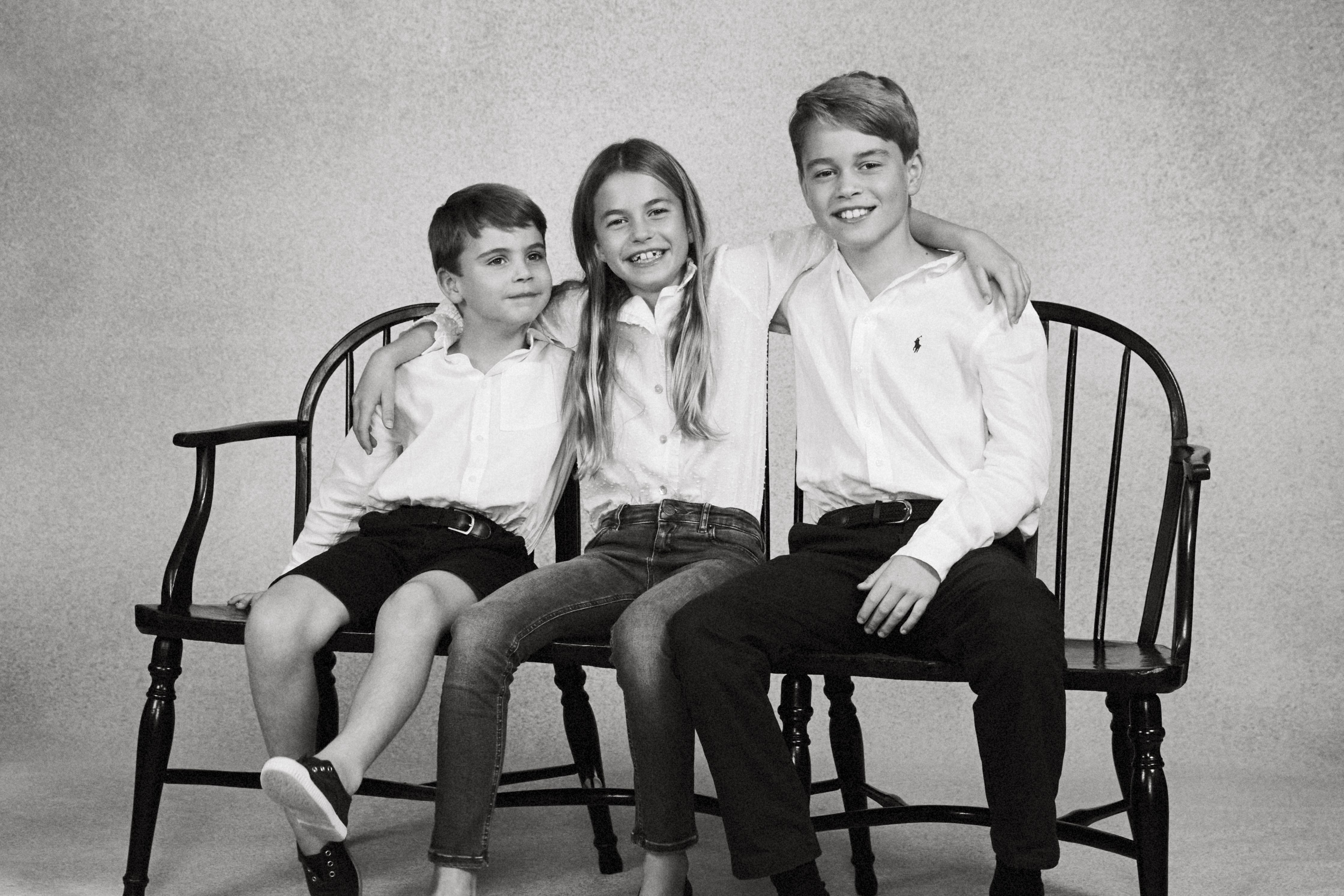 Prince George, Princess Charlotte, and Prince Louis appear without their parents in the black and white photograph (Josh Shinner/Kensington Palace/PA)