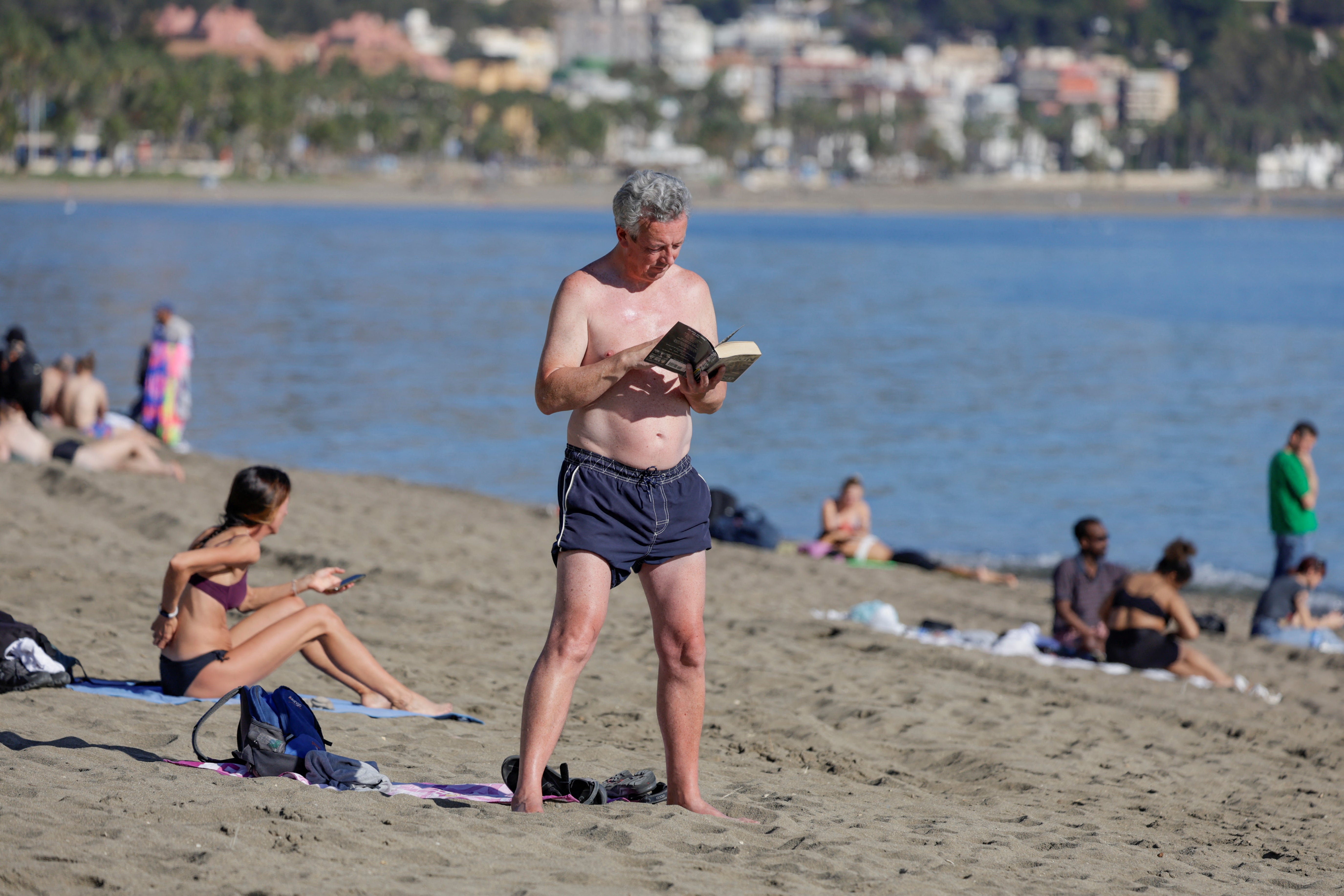 A middle-aged Briton enjoys the warm weather in Malaga, Spain