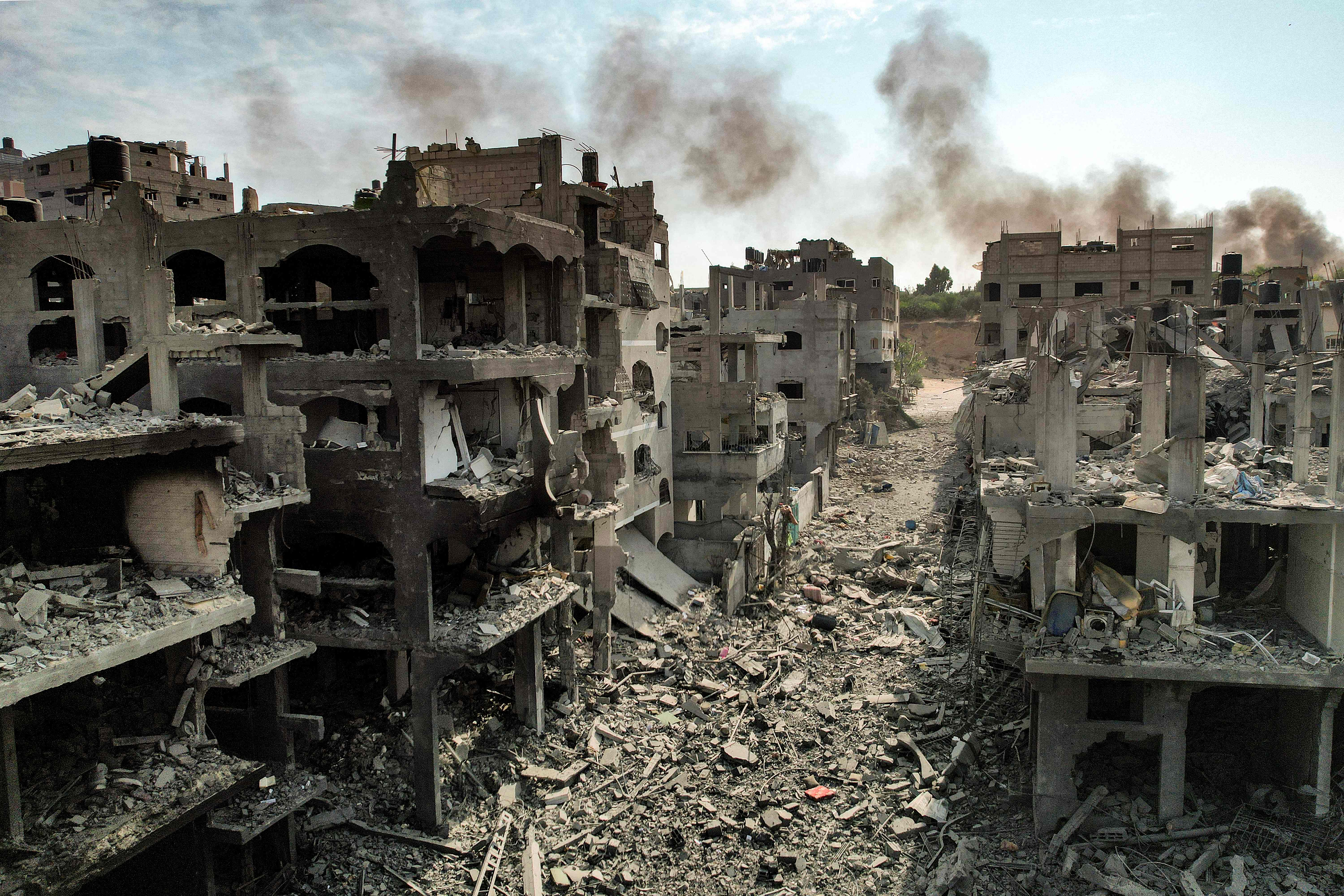 TOPSHOT - -- AFP This picture taken on October 11, 2023 shows an aerial view of buildings destroyed by Israeli air strikes in the Jabalia camp for Palestinian refugees in Gaza City..