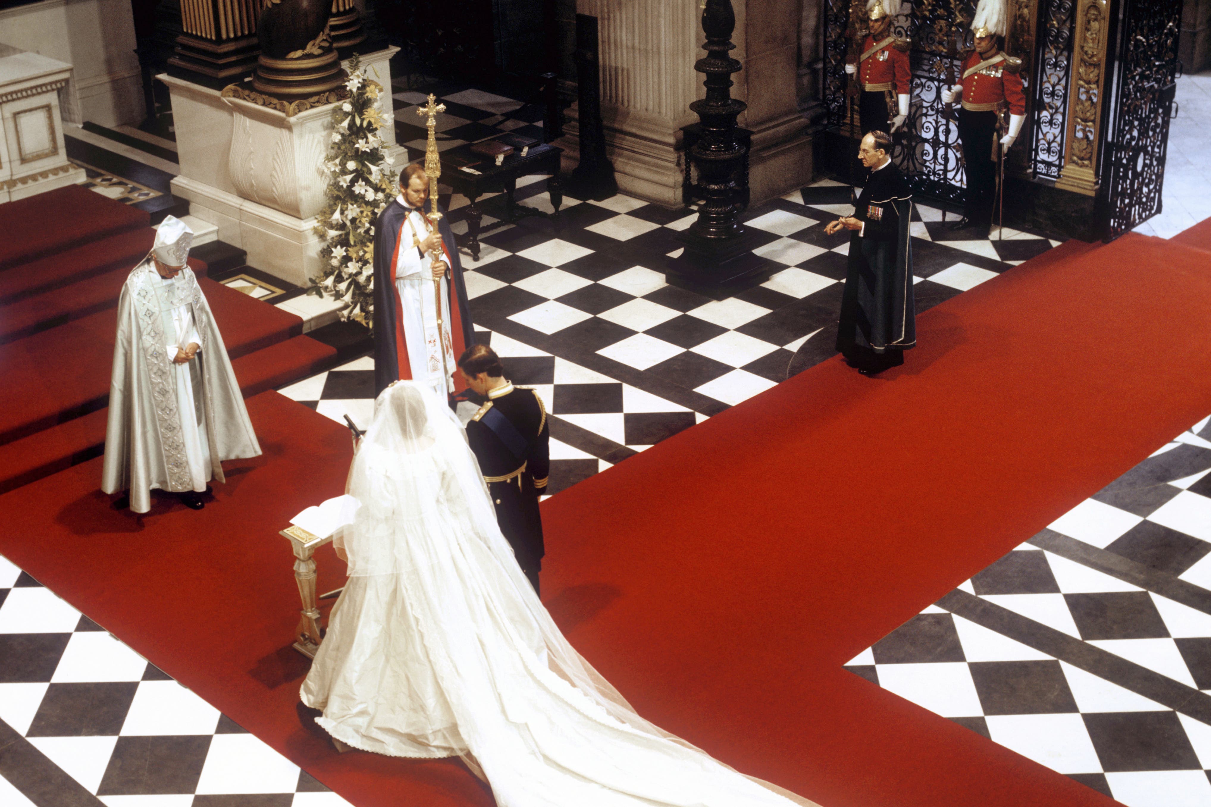 St Paul’s cathedral - The Prince and Princess of Wales at the High Altar in front of the Archbishop of Canterbury, Robert Runcie, during their wedding at St Paul’s Cathedral (PA)