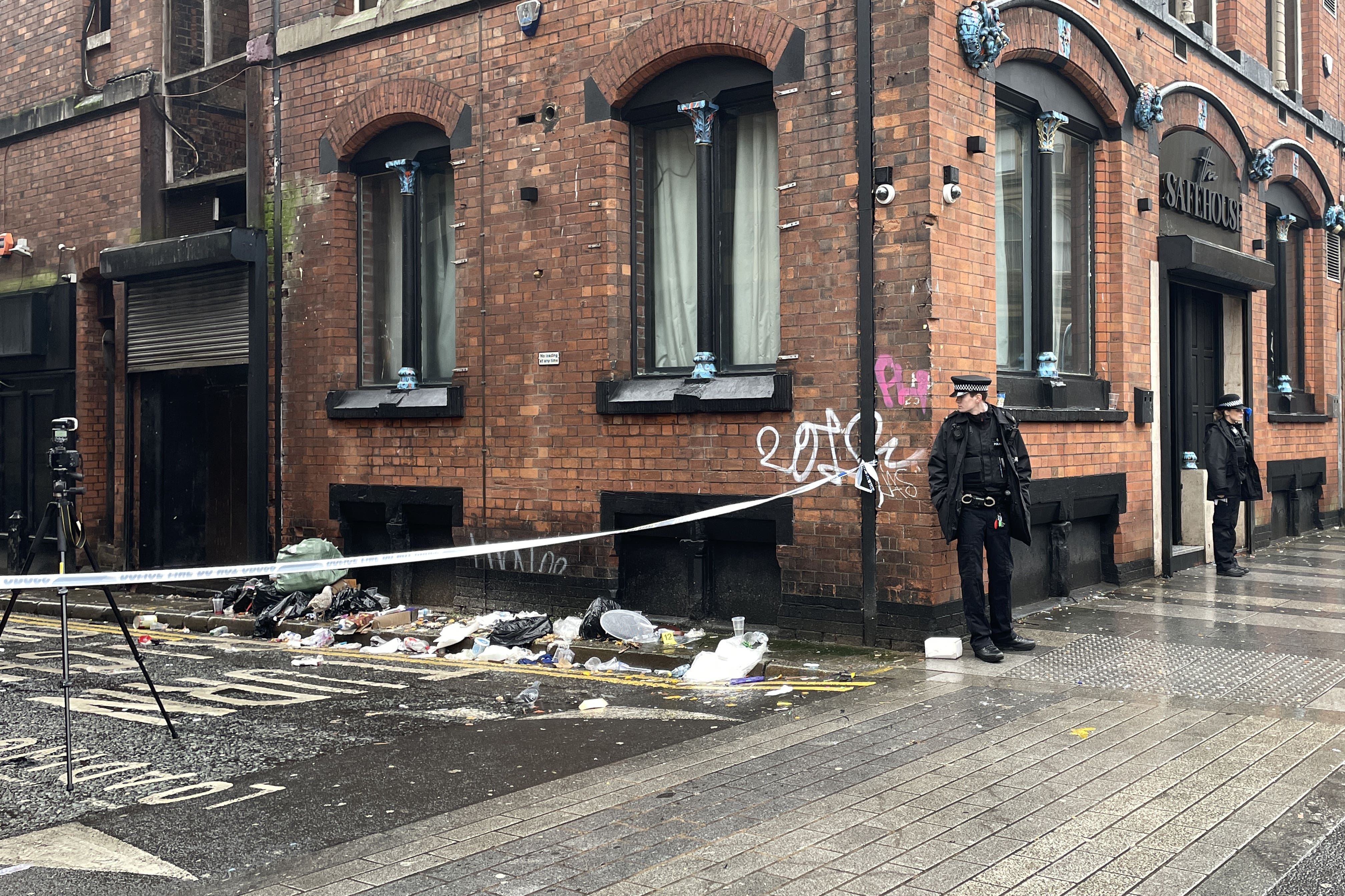 Police officers outside The Safehouse nightclub on Victoria Street in Liverpool (Eleanor Barlow/PA)