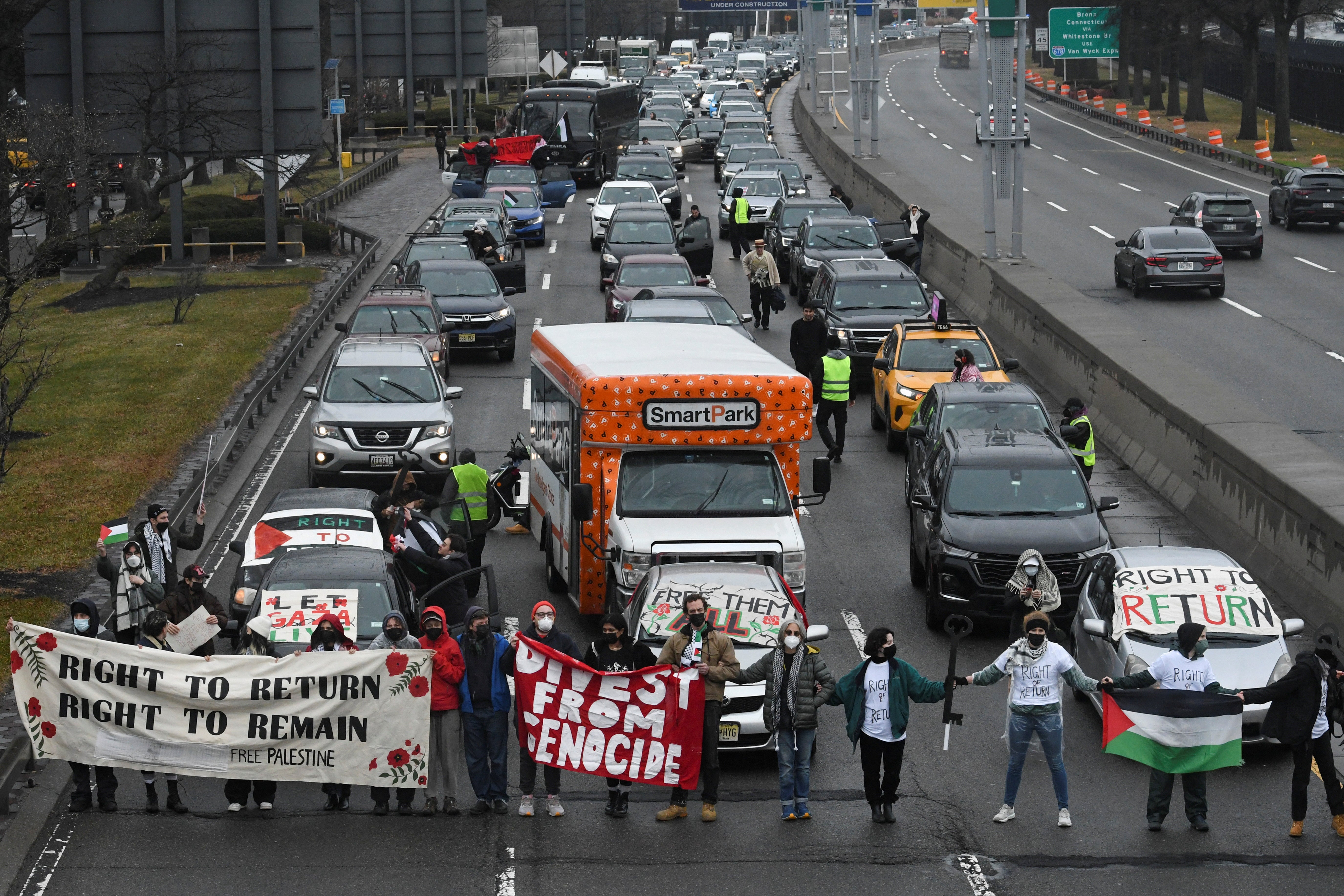 Pro-Palestinian demonstrators block traffic to John F Kennedy airport (JFK) on Wednesday