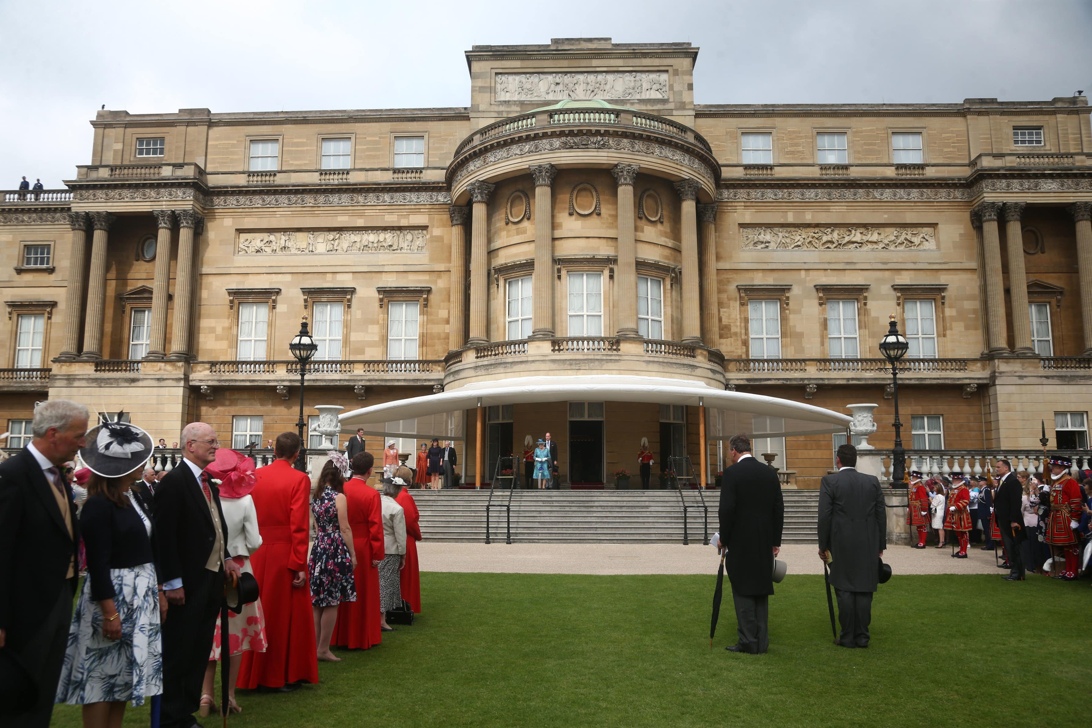 Guests during a garden party at Buckingham Palace (PA)