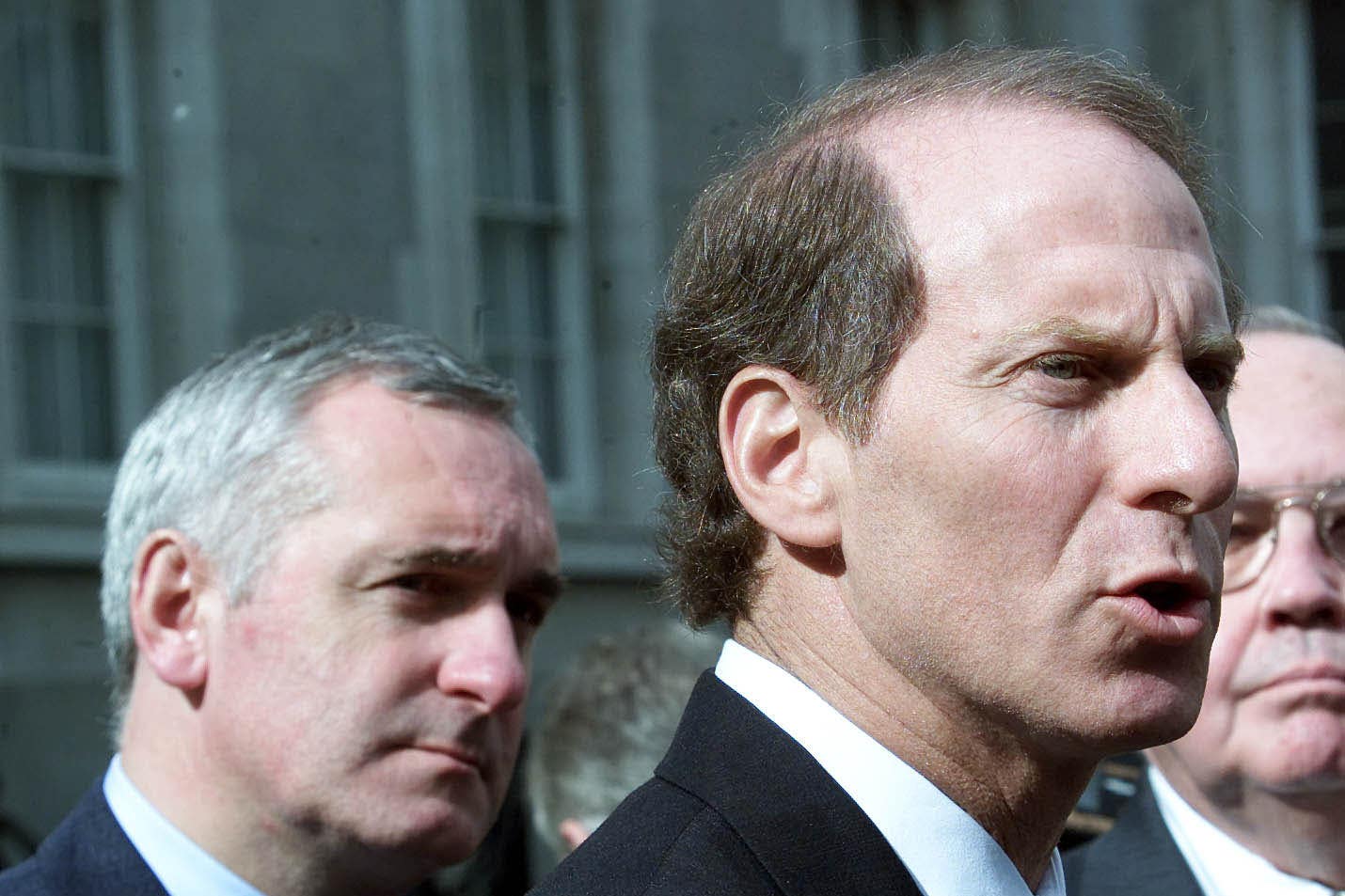 Richard Haass speaking to reporters after having talks with Irish Prime Minister Bertie Ahern (left), at Government Buildings, Dublin (Chris Bacon/PA)