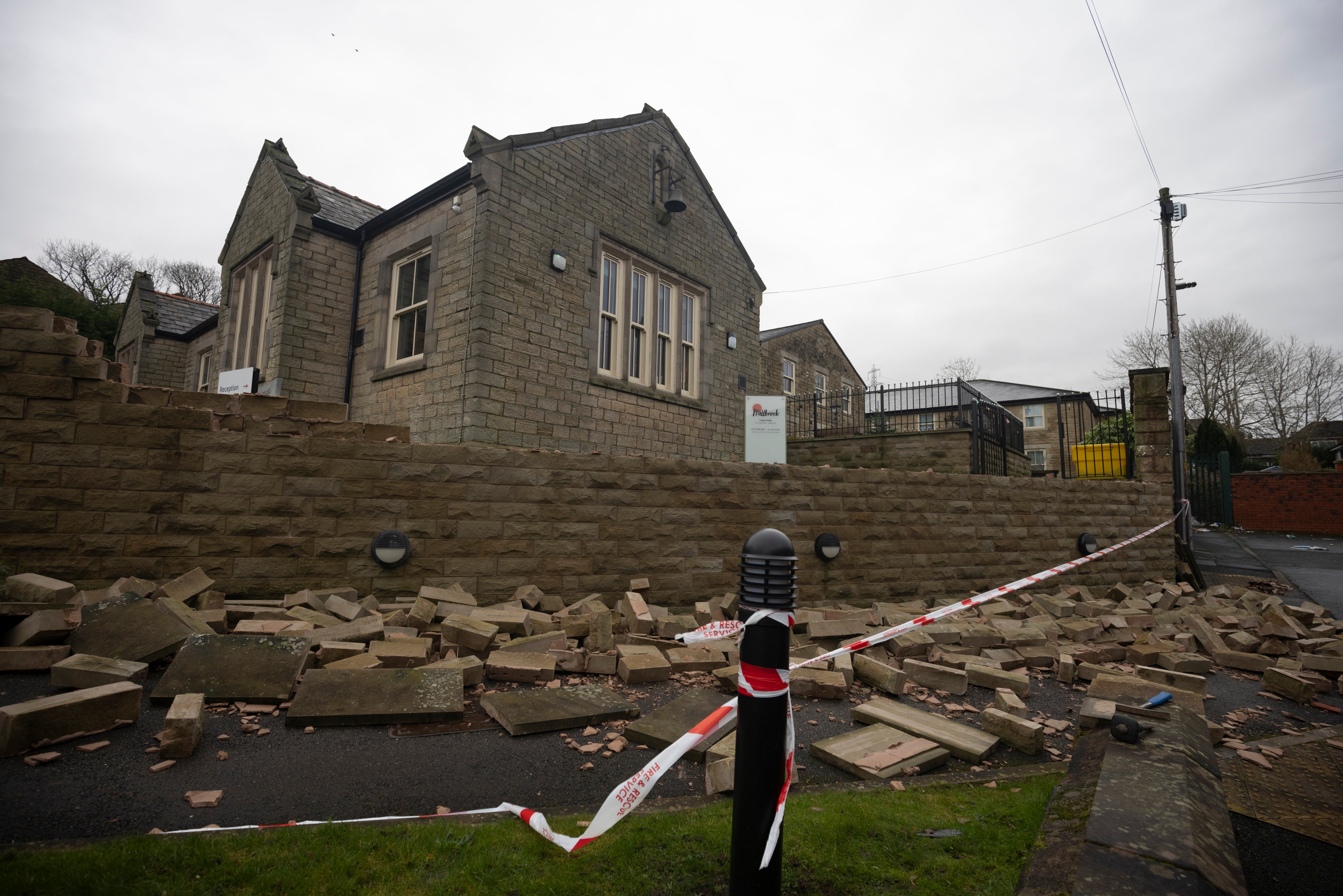 Debris from a wall damaged by the suspected tornado in Stalybridge