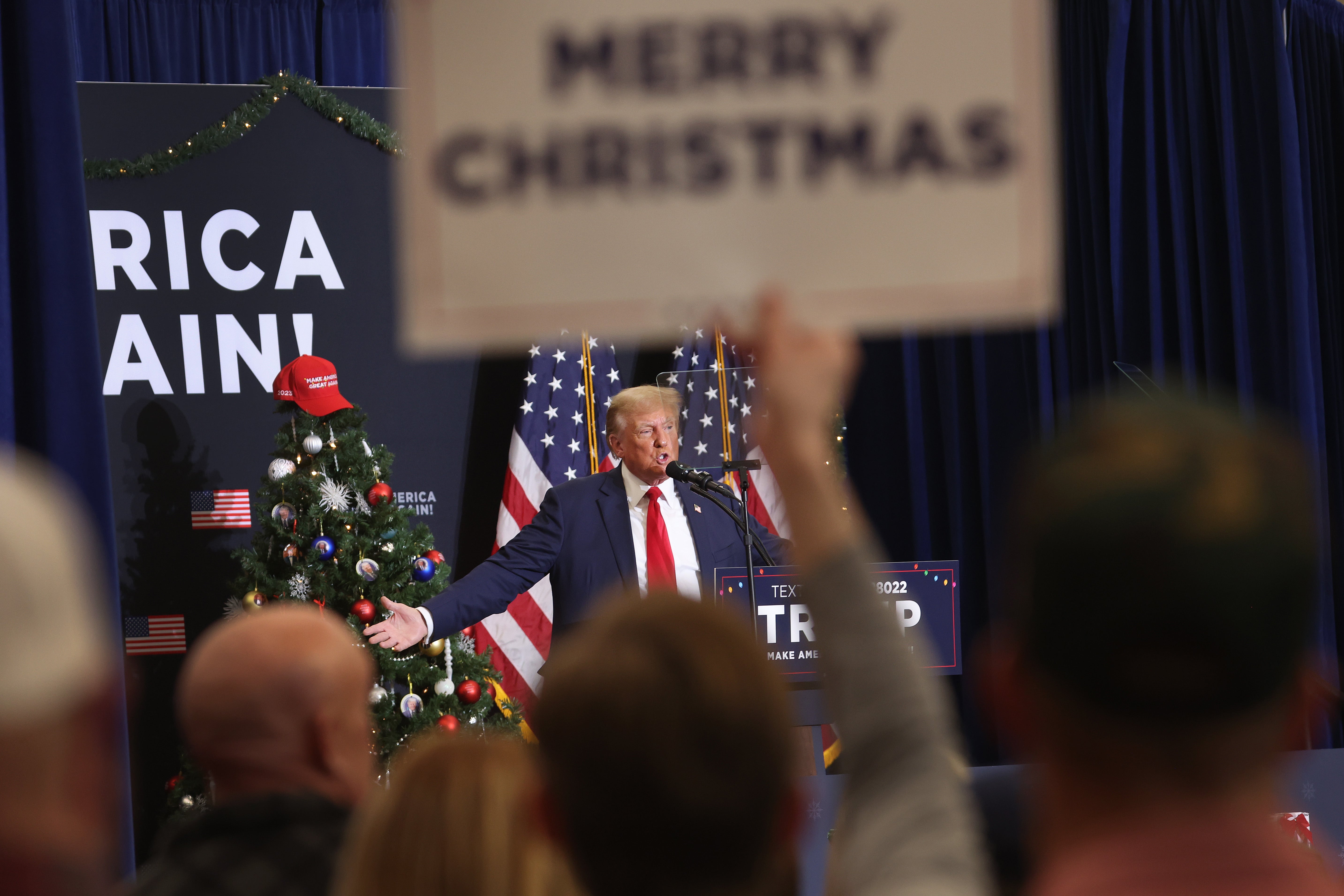 Republican presidential candidate and former US president Donald Trump speaks at a campaign event on 19 December in Waterloo, Iowa