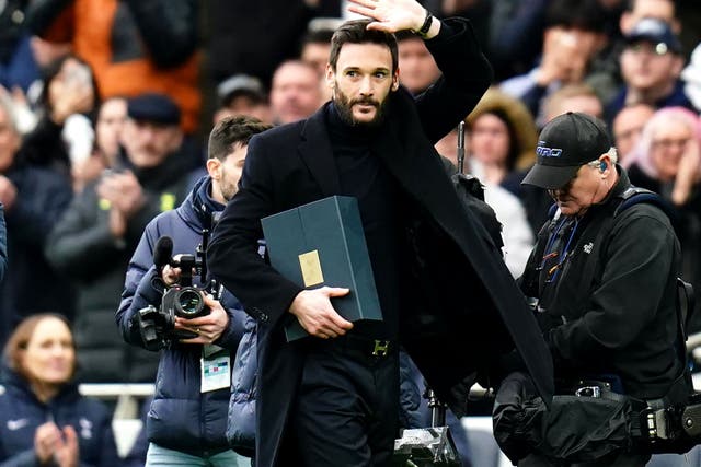 Former Tottenham Hotspur goalkeeper Hugo Lloris waves goodbye to fans at a half-time presentation (John Walton/PA)