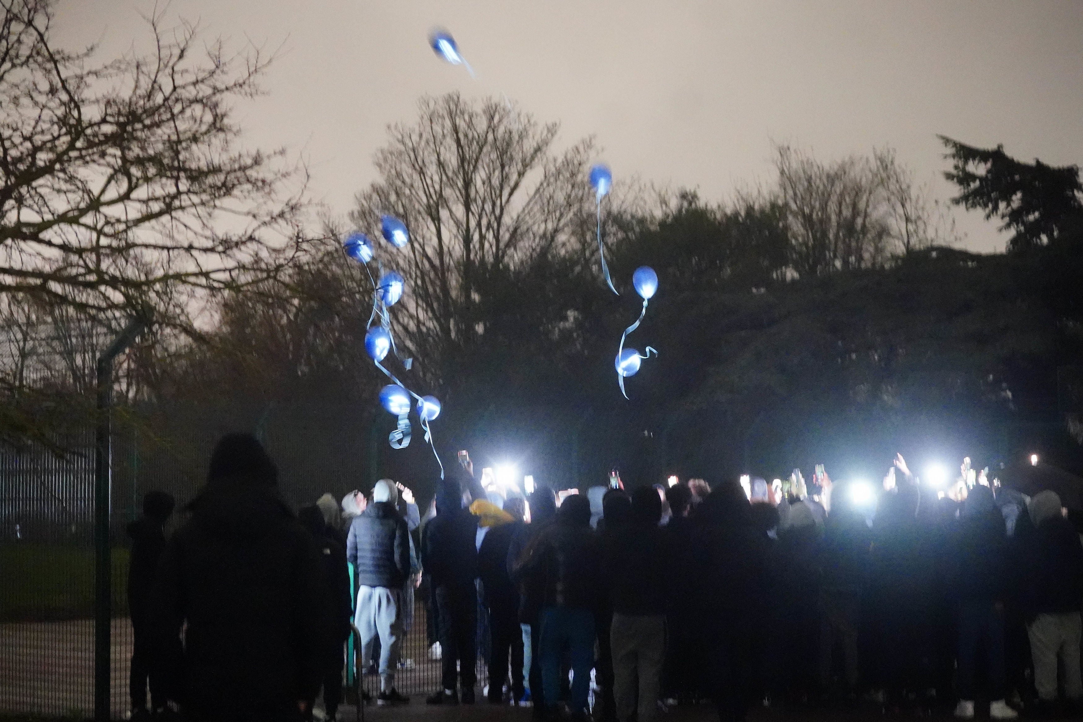 Around a hundred people – including Harry’s mother, brother, and sister – gathered at Downhills Park to pay their respect at a vigil for the “bright and promising” teenager, with many carrying flowers and balloons