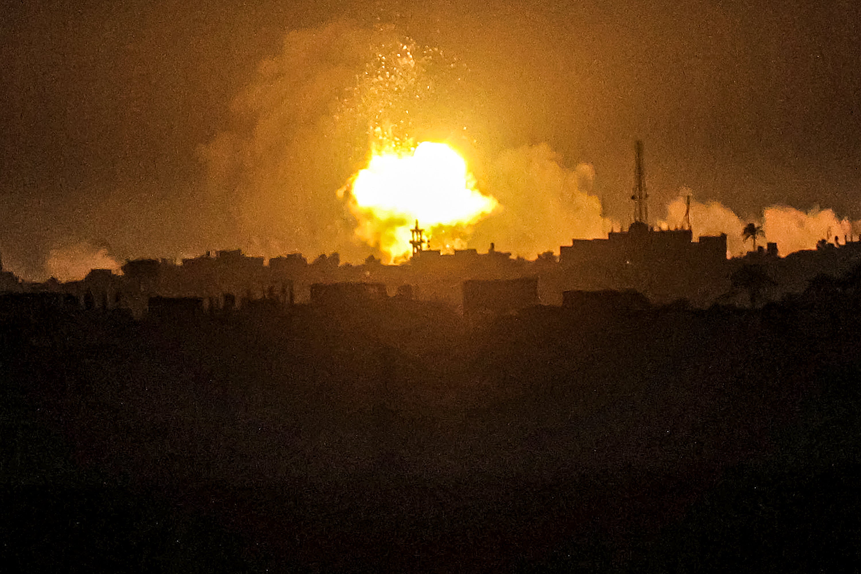 An explosion during Israeli bombardment on Khan Yunis from Rafah in the southern Gaza Strip