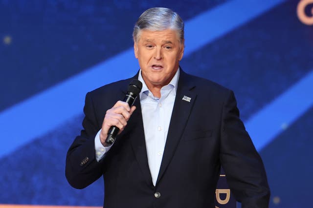 <p>Sean Hannity speaks onstage during the 2023 FOX Nation Patriot Awards at The Grand Ole Opry</p>