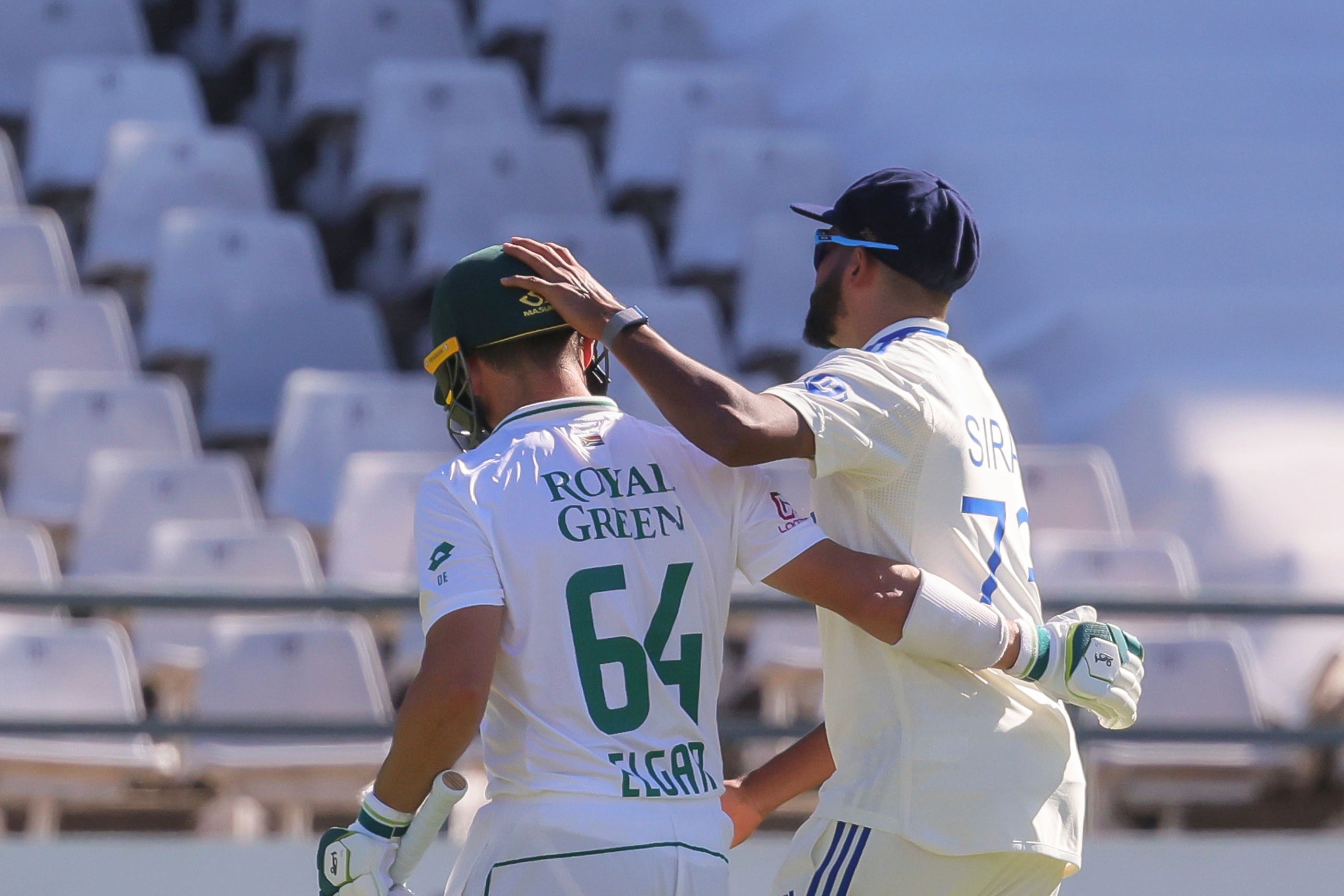 Dean Elgar (left) was dismissed twice as wickets fell rapidly at Newlands (Halden Krog/PA)