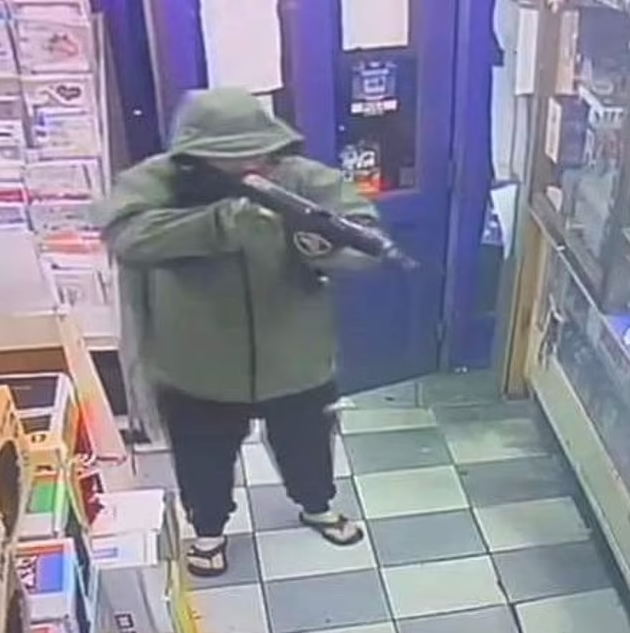 CCTV from the newsagent appears to show a hooded man carrying a large firearm