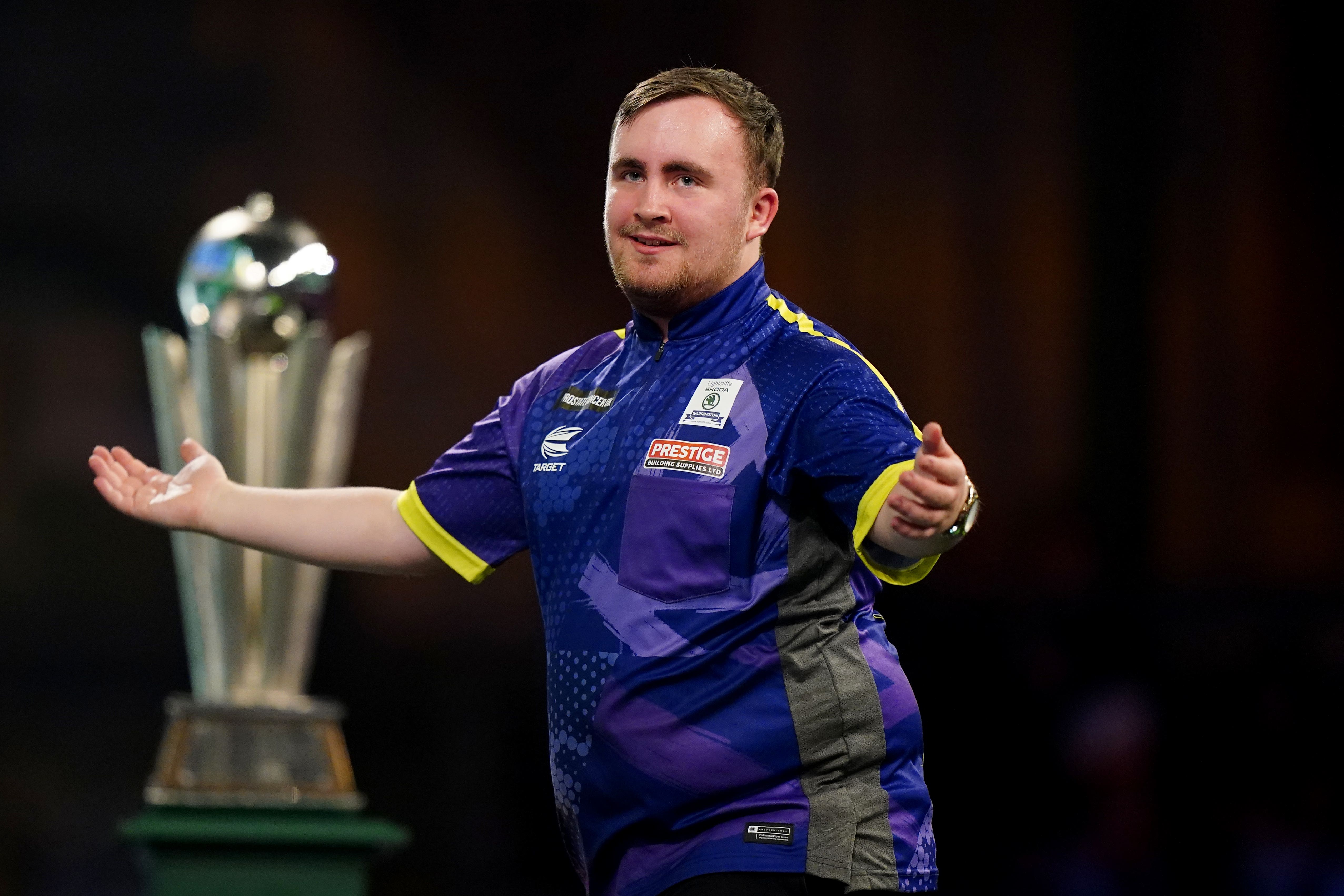 Luke Littler in action against Luke Humphries (Zac Goodwin/PA)