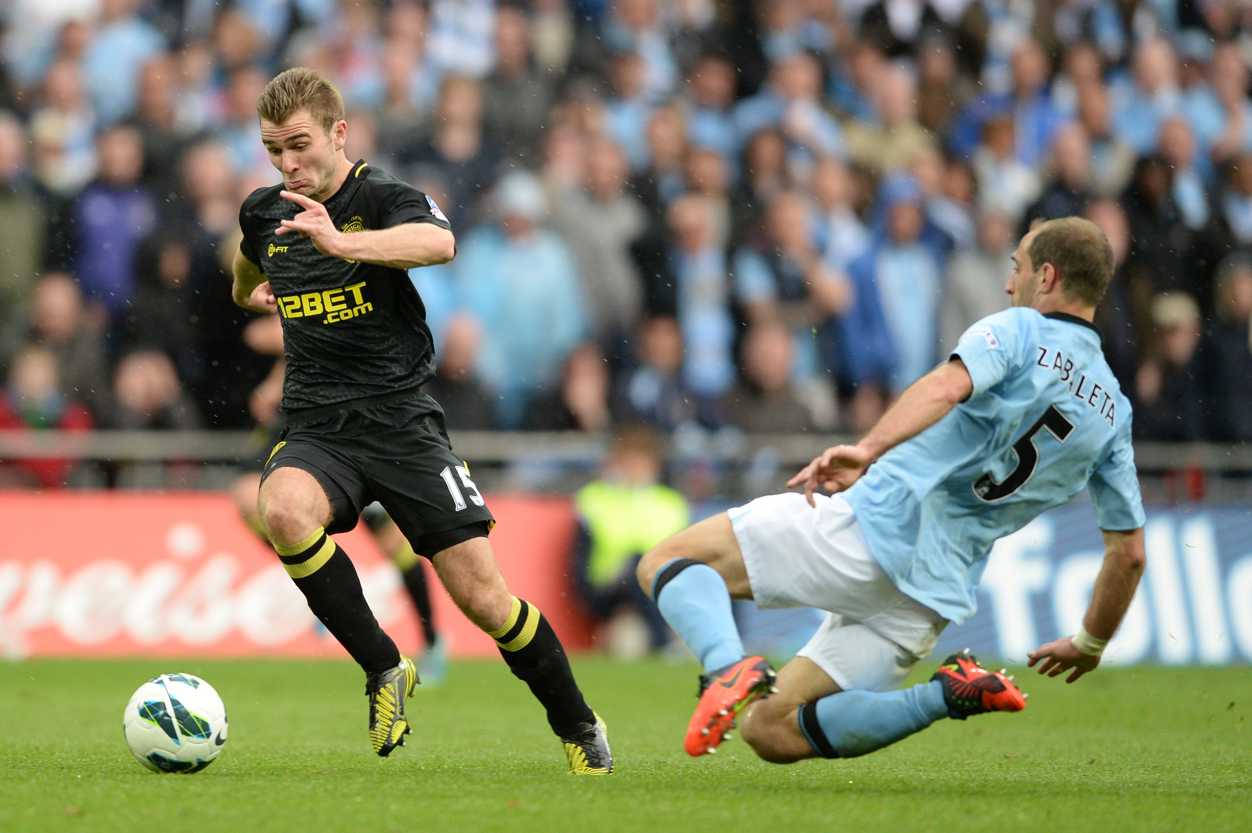 Pablo Zabaleta picked up his second yellow card after this foul on McManaman