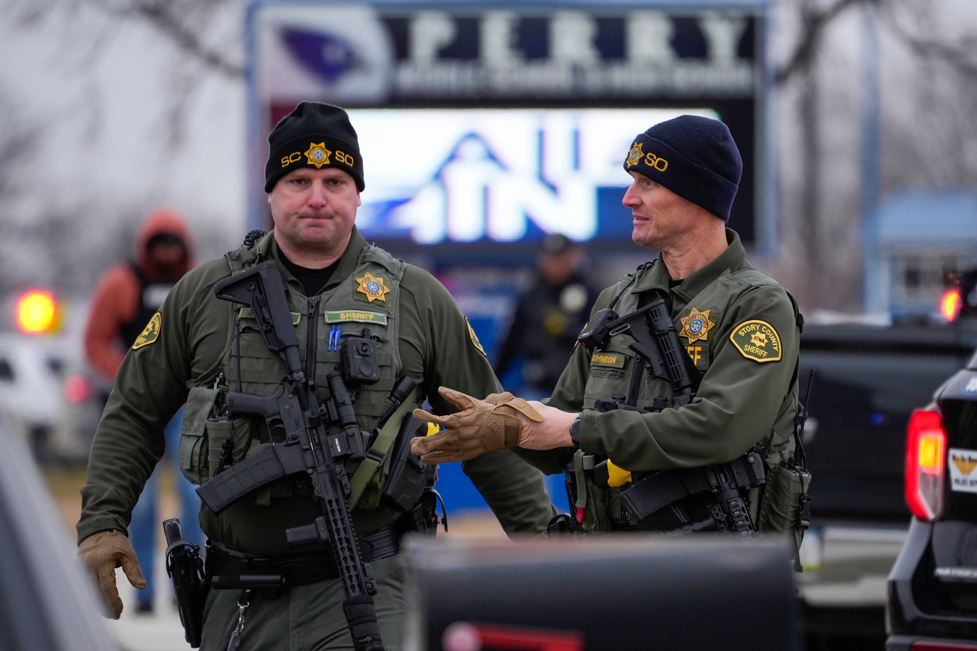 Police respond to Perry High School in Perry, Iowa.