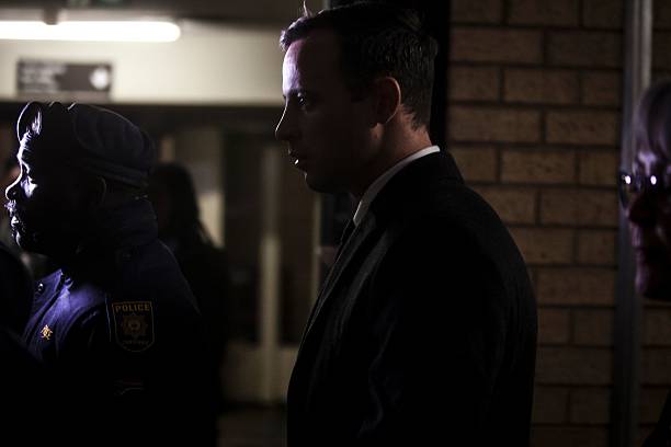 South African Paralympian Oscar Pistorius arrives at the Pretoria High Court