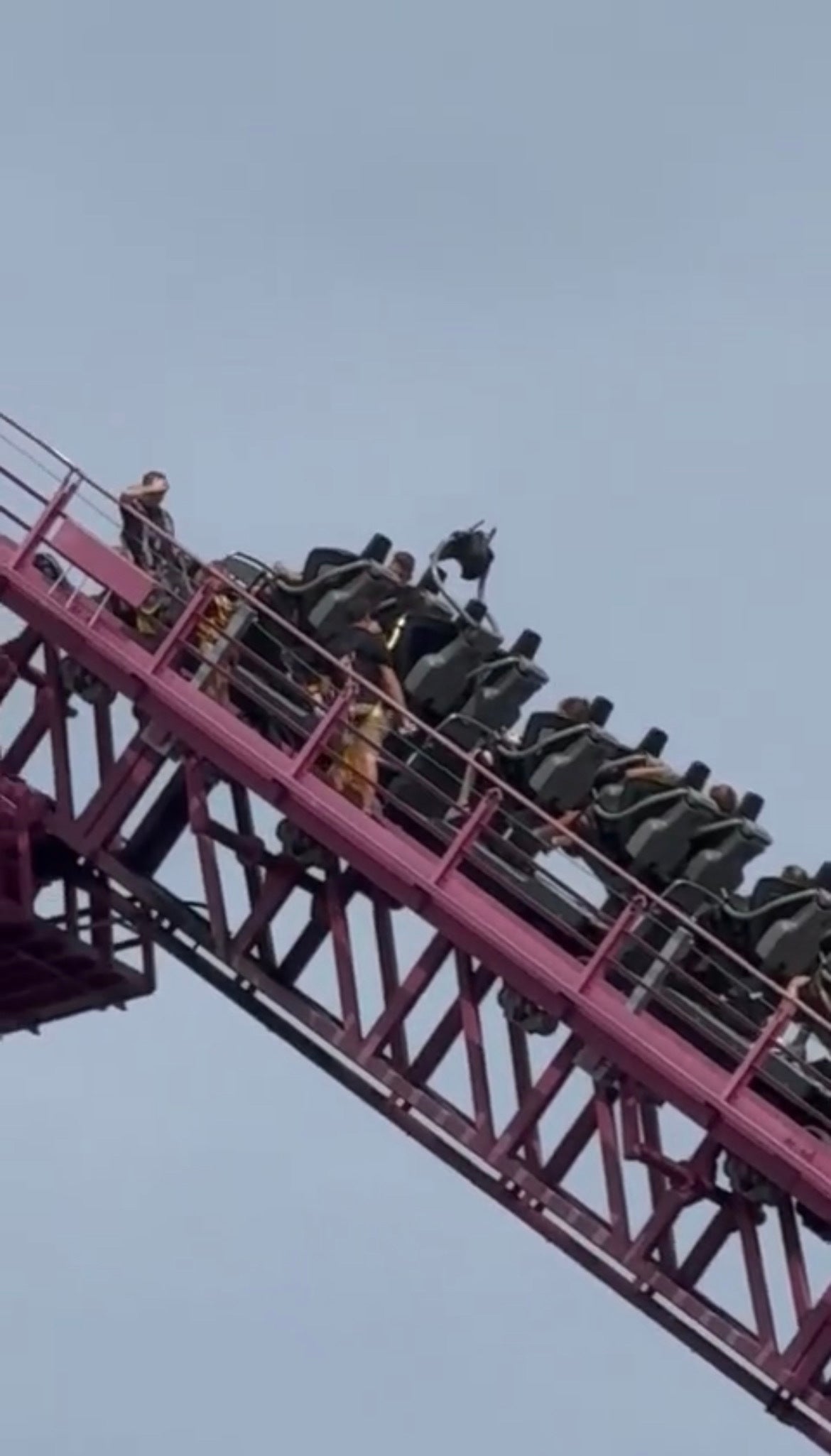 Staff were seen wearing harnesses on the track assisting passengers in their evacuation