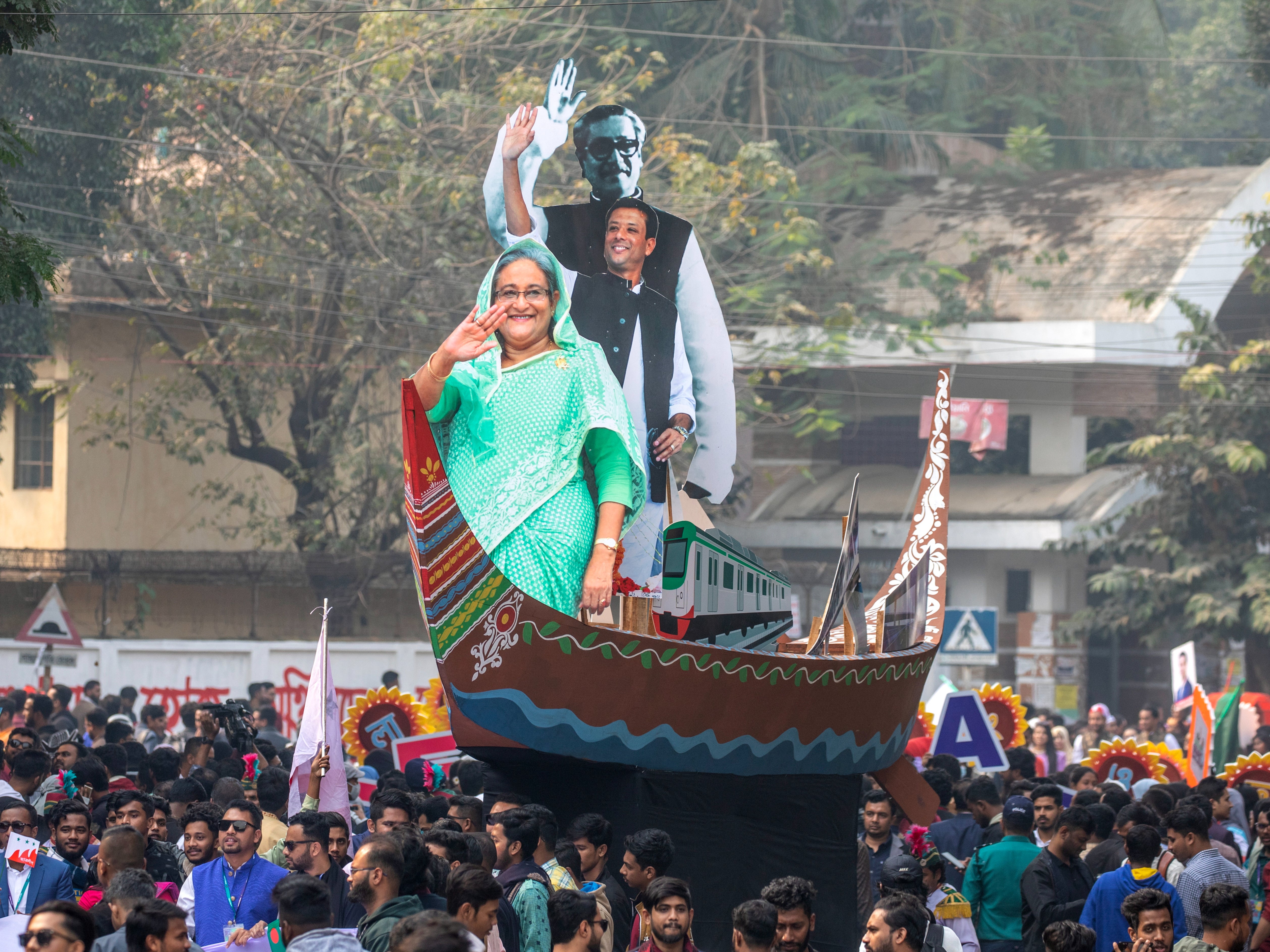 Portraits of prime minister Sheikh Hasina, her son Sajeeb Ahmed Wazed and her father Bangabandhu Sheikh Mujibur Rahman taken out by Bangladesh Chhatra League