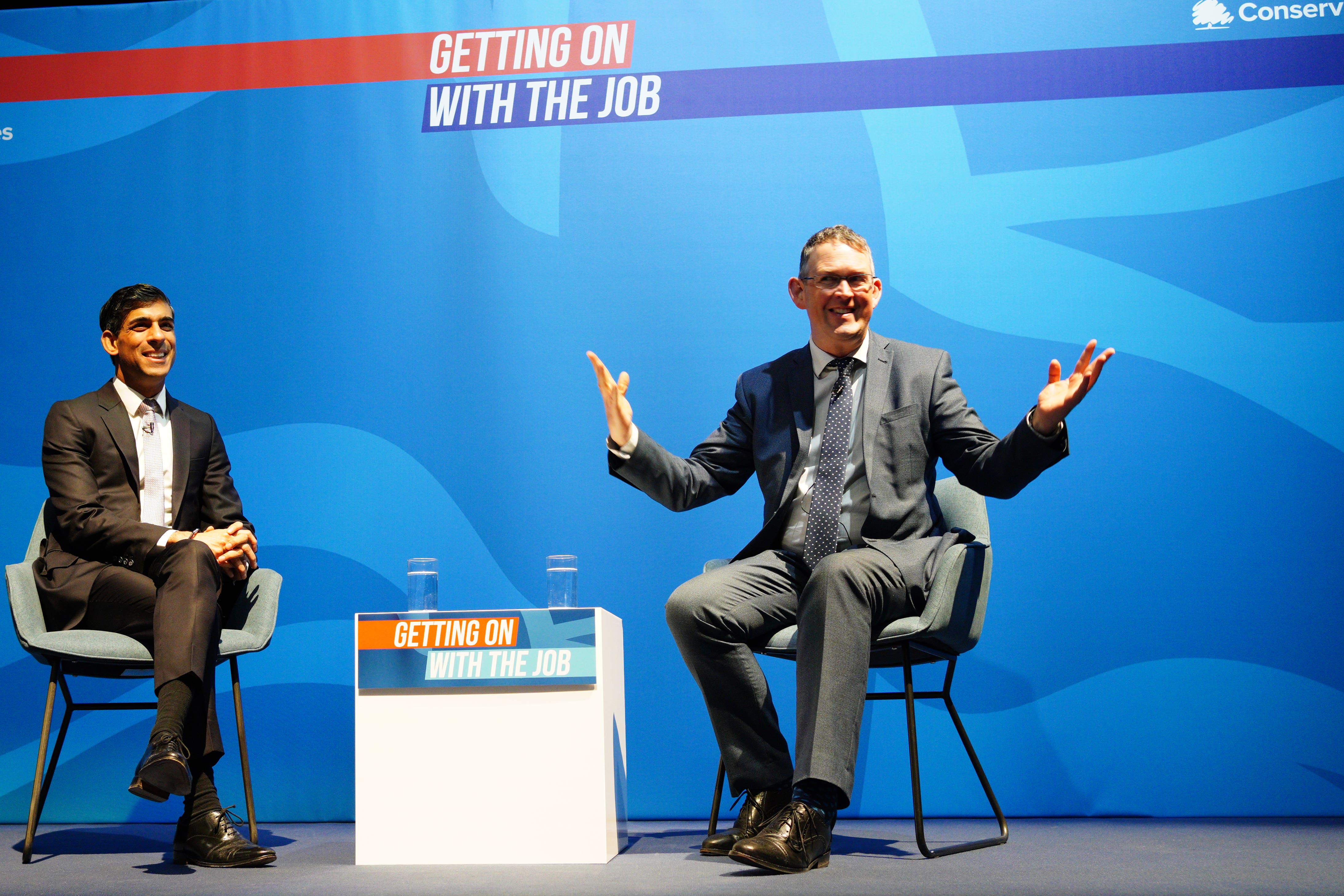 Rishi Sunak (left) pictured with pensions minister Paul Maynard in March 2022 (Peter Byrne/PA)